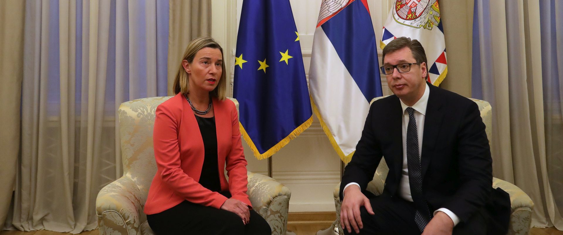 epa06632606 Serbian President Aleksandar Vucic (R) talks with Federica Mogherini (L), the High Representative of the European Union for Foreign Affairs and Security Policy, during their meeting in Belgrade, Serbia, 27 March 2018. Mogherini visited Belgrade to lower the tensions between Belgrade and Pristina after a Kosovo Police special unit detained and later expelled Serbian top official for Kosovo and Metohija Marko Djuric, in northern city of Mitrovica on 26 March 2018, for entering Kosovo despite a ban on his presence.  EPA/ANDREJ CUKIC