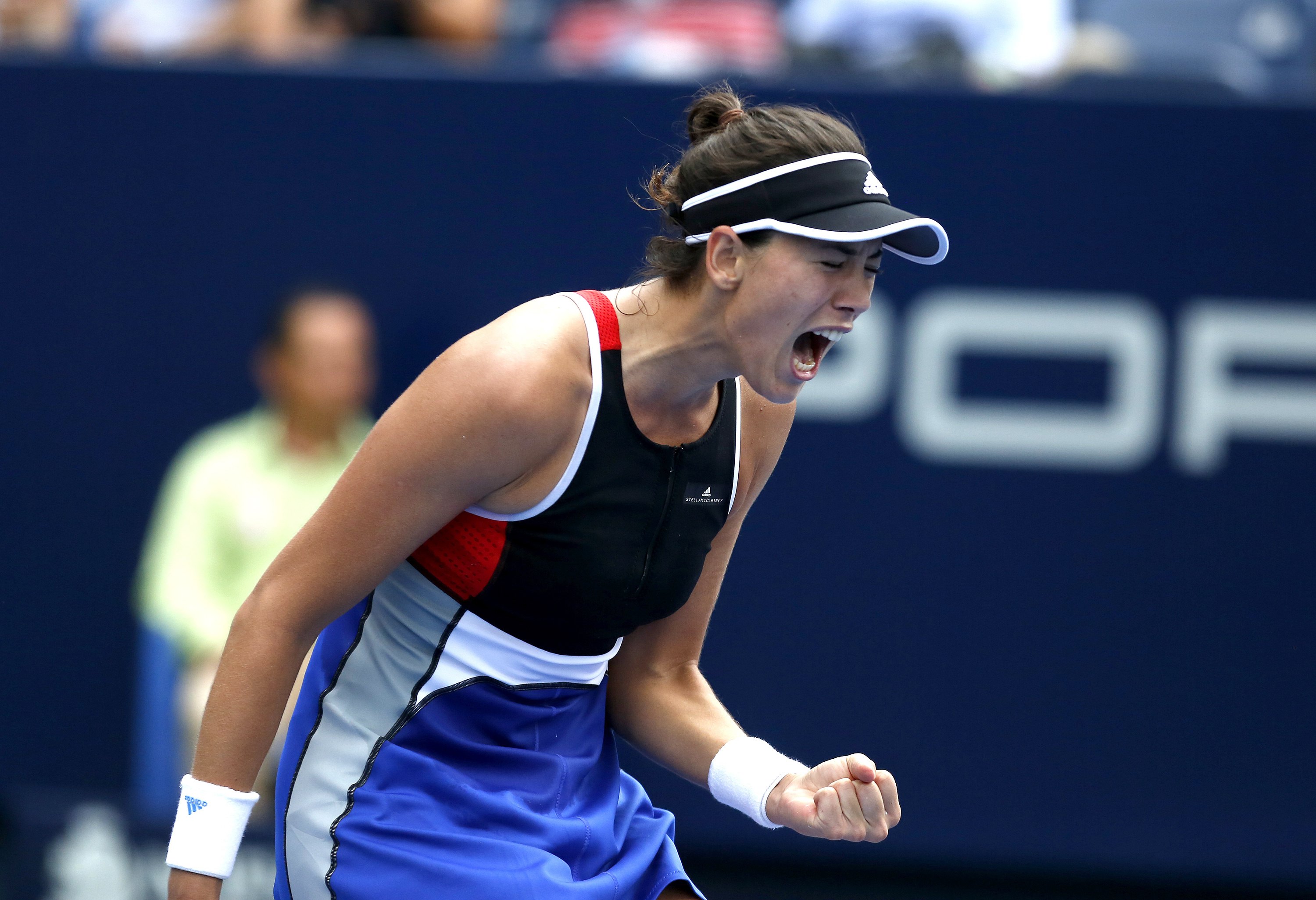 epa06653888 Garbina Muguruza of Spain jubilates her victory over Ana Bogdan of Romania during the sixth day of the Monterrey Tennis Open in Monterrey, Mexico, 07 April 2018.  EPA/MIGUEL SIERRA