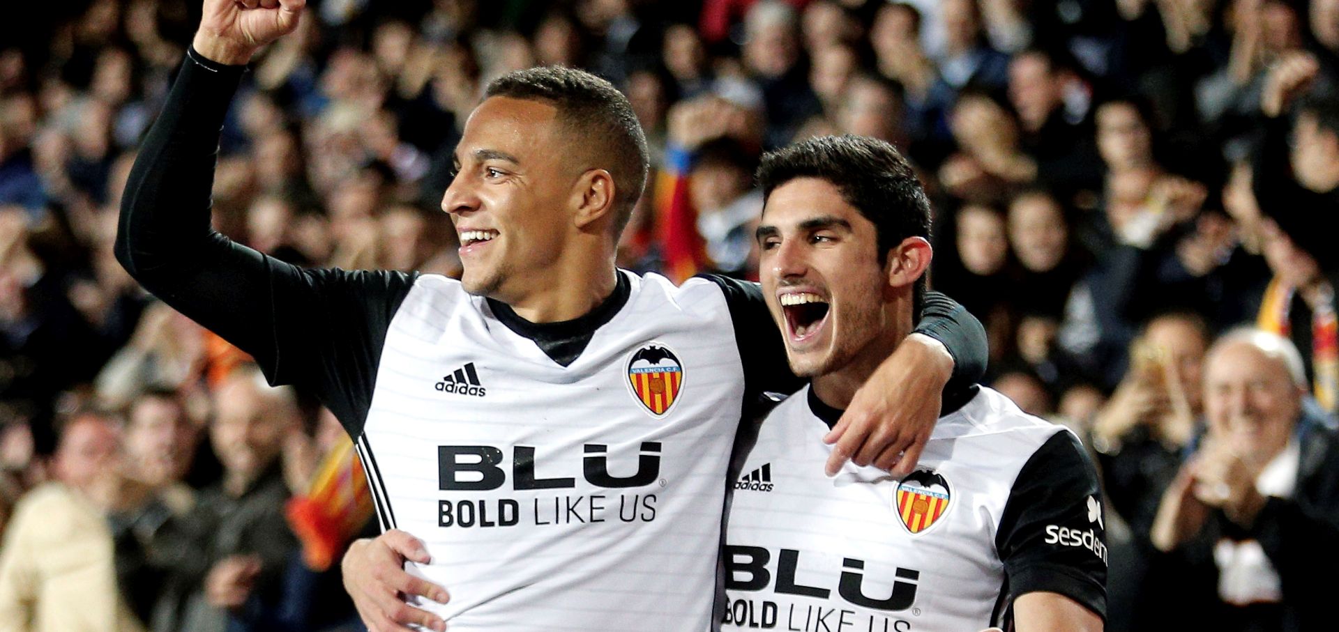 epa06655819 Valencia's forward Rodrigo Moreno celebrates with winger Goncalo Guedes (R) after scoring a goal against Espanyol during the Spanish Primera Division match between Valencia CF and RCD Espanyol at Mestalla stadium in Valencia, Spain, 08 April 2018.  EPA/Manuel Bruque