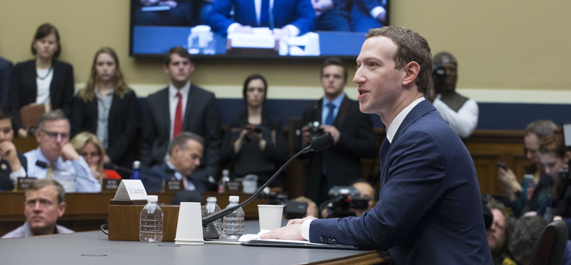 epa06661660 CEO of Facebook Mark Zuckerberg (R) testifies before the House Energy and Commerce Committee hearing on 'Facebook: Transparency and Use of Consumer Data' on Capitol Hill in Washington, DC, USA, 11 April 2018. Zuckerberg is testifying before the second of two Congressional hearings this week regarding Facebook allowing third-party applications to collect the data of its users without their permission and for the company's response to Russian interference in the 2016 US presidential election.  EPA/MICHAEL REYNOLDS