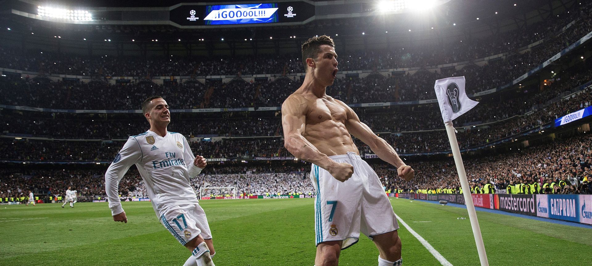 epa06662446 Real Madrid's Cristiano Ronaldo (R) celebrates next to Lucas Vazquez (L) after scoring the 1-3 during the UEFA Champions League quarter final, second leg soccer match between Real Madrid and Juventus at Santiago Bernabeu stadium in Madrid, Spain, 11 April 2018.  EPA/RODRIGO JIMENEZ