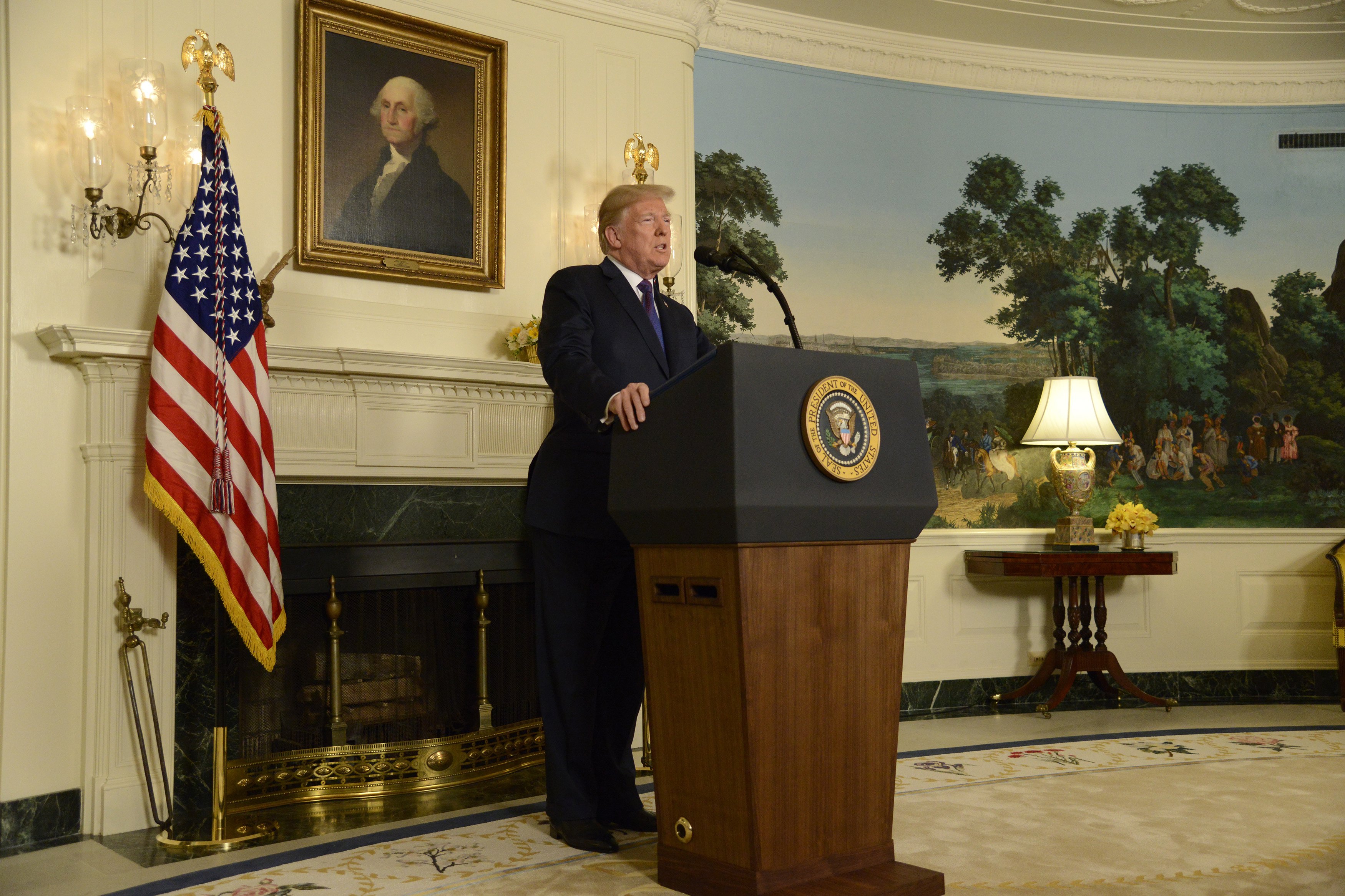 epa06667770 US President Donald J. Trump makes remarks as he speaks to the nation, announcing military action against Syria in response to the recent alleged gas attack on civilians in Douma, at the White House in Washington, DC, USA, 13 April 2018.  EPA/MIKE THEILER / POOL