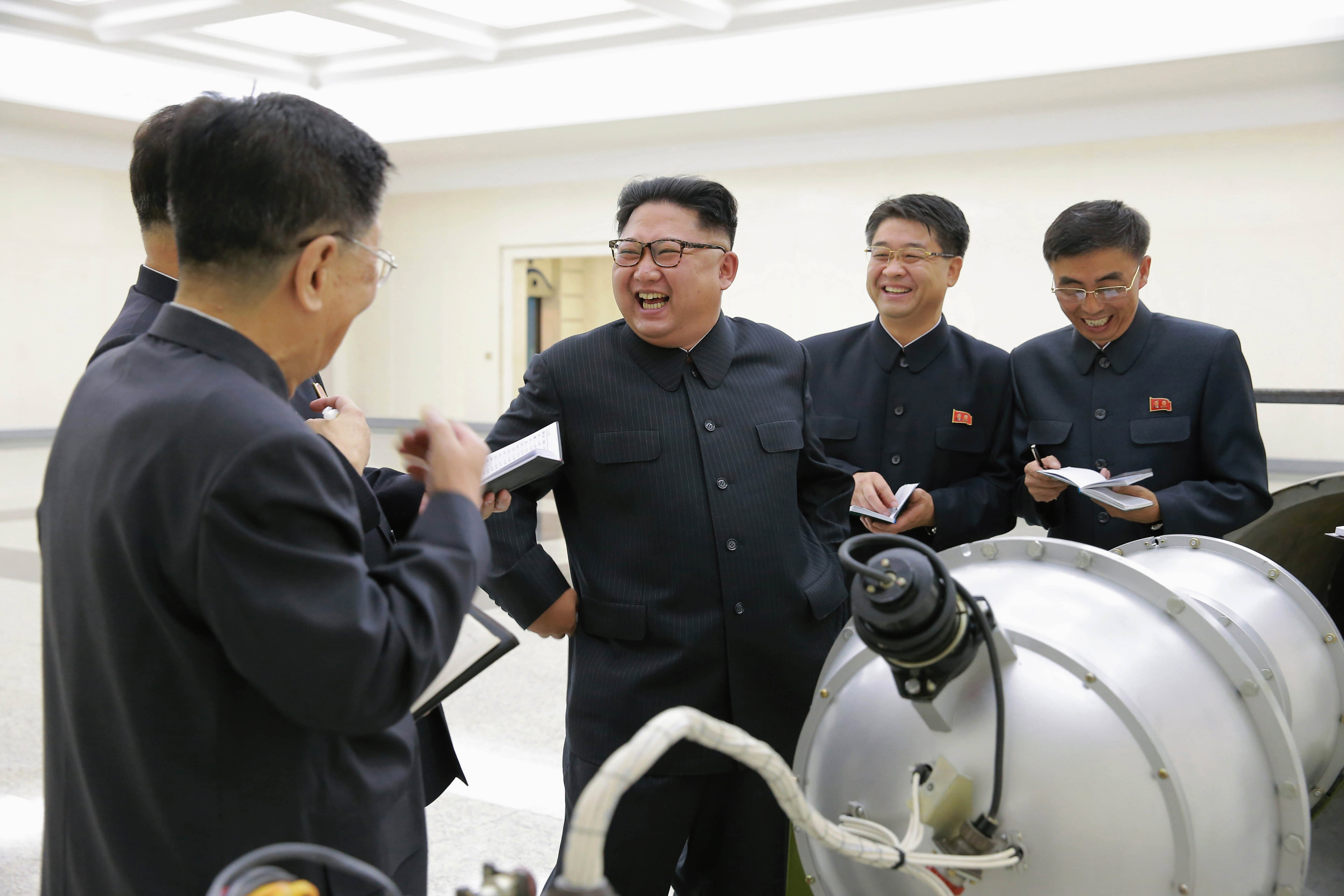 epa06683143 (FILE) - An undated photo released on 03 September 2017 by the North Korean Central News Agency (KCNA), the state news agency of North Korea, shows Kim Jong-un (3-R), chairman of the Workers' Party of Korea, chairman of the State Affairs Commission of the Democratic People's Republic of Korea (DPRK) and supreme commander of the Korean People's Army (KPA), purportedly guiding the work for nuclear weaponization on spot, at an undisclosed location, North Korea (reissued 21 April 2018). North Korean leader Kim Jong-Un announced that from 21 April 2018, North Korea will stop nuclear and intercontinental ballistic missile testing. According to KCNA, a a nuclear test site in the north of the country would be shut down.  EPA/KCNA   EDITORIAL USE ONLY *** Local Caption *** 53744259