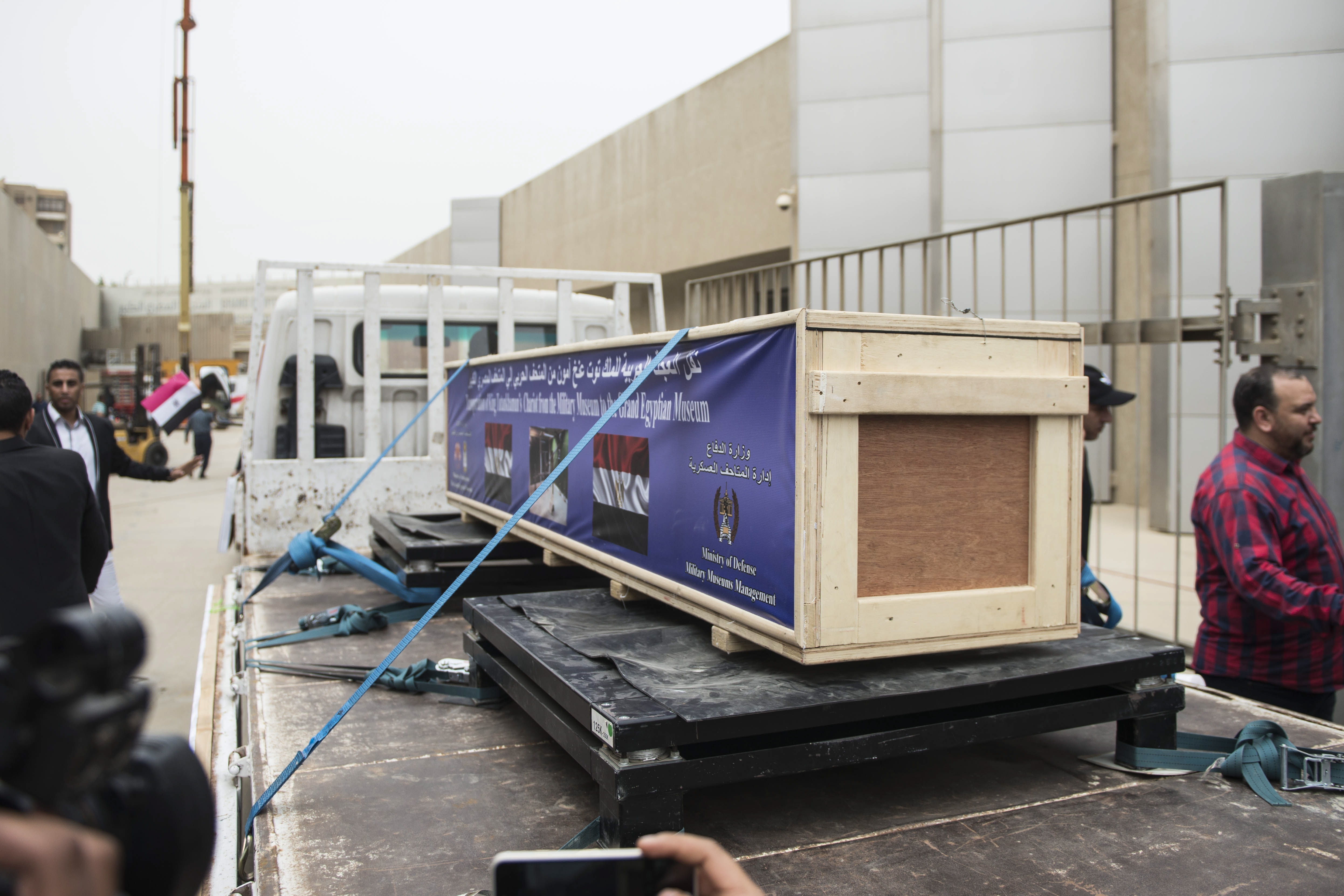 epa06712547 Trucks carrying the last chariot of Tutankhamun arrive to the Grand Egyptian Museum (GEM), Giza, Egypt, 05 May 2018. The sixth and last chariot of Tutankhamun arrived to GEM from the military museum. The GEM will hold all the 5398 artifacts of Tutankhamun for the first time in history, which were previously on display at the Egyptian Museum in Tahrir, Luxor Museum, and the Military Museum. The Grand Egyptian Museum is located two kilometers away from the Pyramids of Giza and is expected to have a soft opening in the second half of 2018.  EPA/MOHAMED HOSSAM