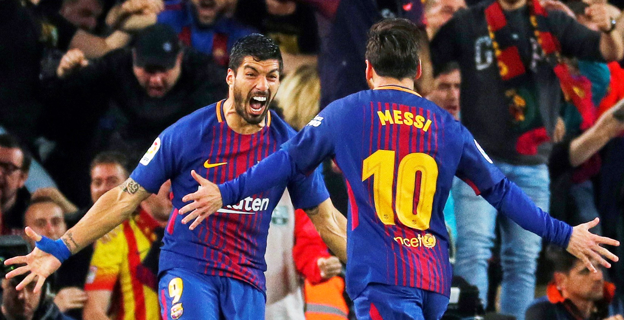 epa06715892 FC Barcelona's striker Lionel Messi (R) celebrates with his teammate Luis Suarez (L) after scoring the 2-1 lead during the Spanish Primera Division soccer match between FC Barcelona and Real Madrid at Camp Nou in Barcelona, Spain, 06 May 2018.  EPA/ALEJANDRO GARCIA
