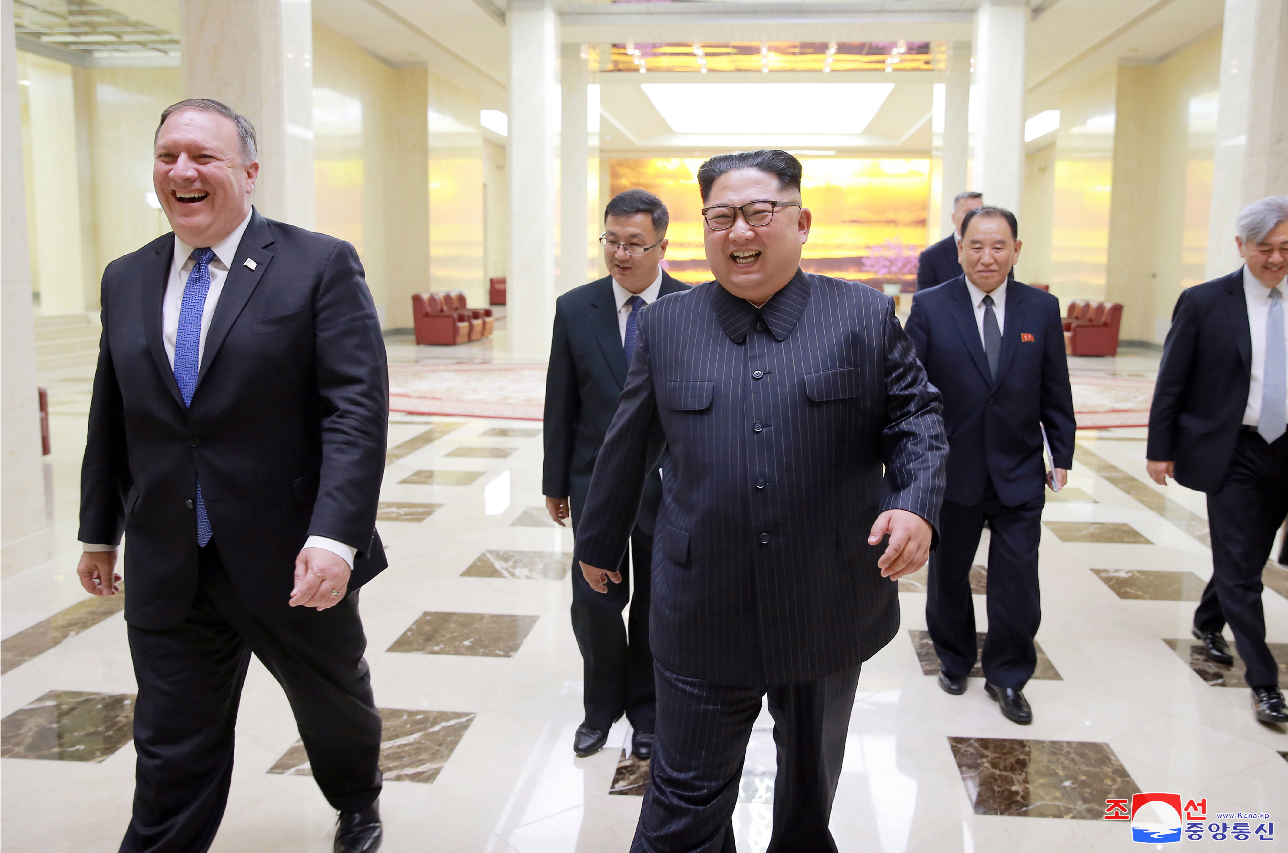 epa06724152 A photo released by the official North Korean Central News Agency (KCNA), the state news agency of North Korea, shows Kim Jong Un (C), chairman of the Workers' Party of Korea and chairman of the State Affairs Commission of the Democratic People's Republic of Korea, walks with Mike Pompeo (L), secretary of State of the United States of America, in Pyongyang, North Korea, 09 May 2018 (issued 10 May 2018).  EPA/KCNA   EDITORIAL USE ONLY
