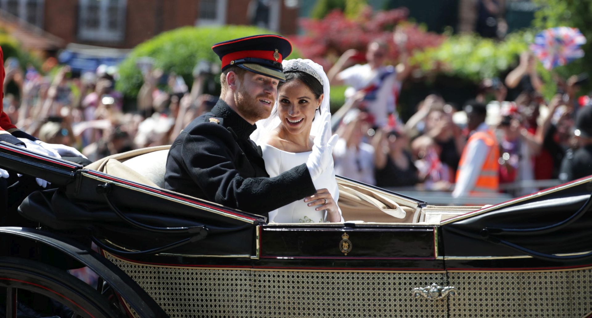 epa06749542 A handout photo made available by the British Ministry of Defence shows Britain's Prince Harry (L) and Meghan Markle (R), Duke and Duchess of Sussex, during a procession after their royal wedding ceremony in St George's Chapel at Windsor Castle in Windsor, Britain, Britain, 19 May 2018. The Royal Navy, British Army and Royal Air Force are all providing ceremonial support to mark the occasion.  EPA/OWEN COOBAN / BRITISH MINISTRY OF DEFENCE / HANDOUT MANDATORY CREDIT: CROWN COPYRIGHT HANDOUT EDITORIAL USE ONLY/NO SALES