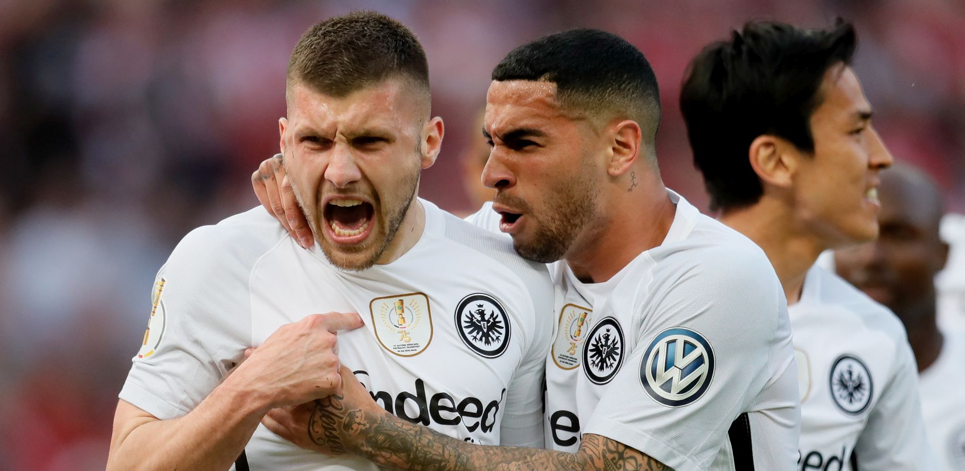 epa06751094 Frankfurt's Ante Rebic (C) celebrates scoring the first goal with  Frankfurt's Omar Mascarell (R) during the German DFB Cup final soccer match between FC Bayern Munich and Eintracht Frankfurt at the Olympic Stadium in Berlin, Germany, 19 May 2018.  
(ATTENTION: The DFB prohibits the utilisation and publication of sequential pictures on the internet and other online media during the match (including half-time). ATTENTION: BLOCKING PERIOD! The DFB permits the further utilisation and publication of the pictures for mobile services (especially MMS) and for DVB-H and DMB only after the end of the match.)  EPA/RONALD WITTEK