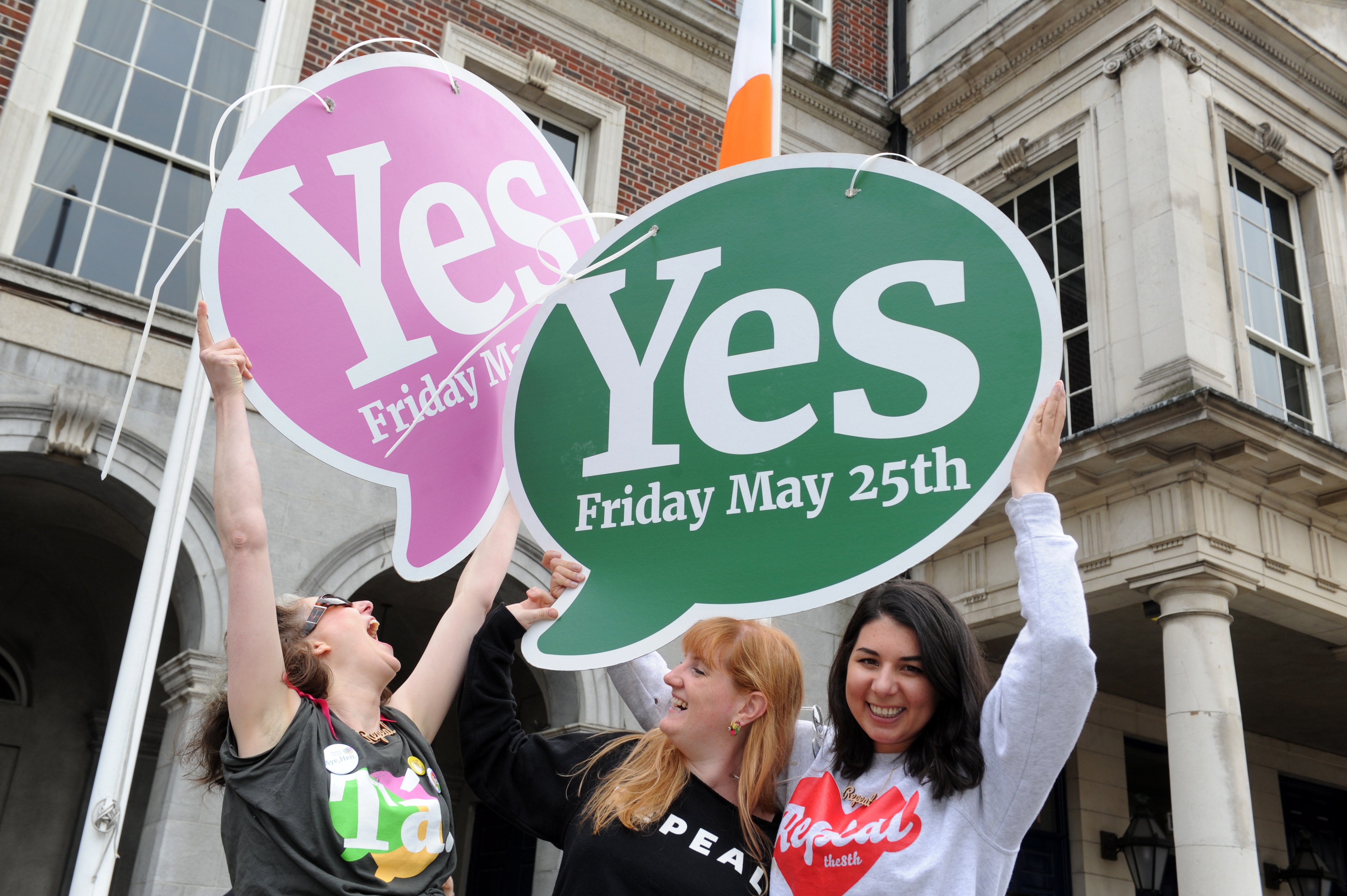 epa06764672 Women celebrate with Yes vote signs after a referndum on abortion, in Dublin, Ireland, 26 May 2018. Ireland has voted overwhelmingly to legalize abortion in a historic referendum on 25 May 2018.  EPA/AIDAN CRAWLEY
