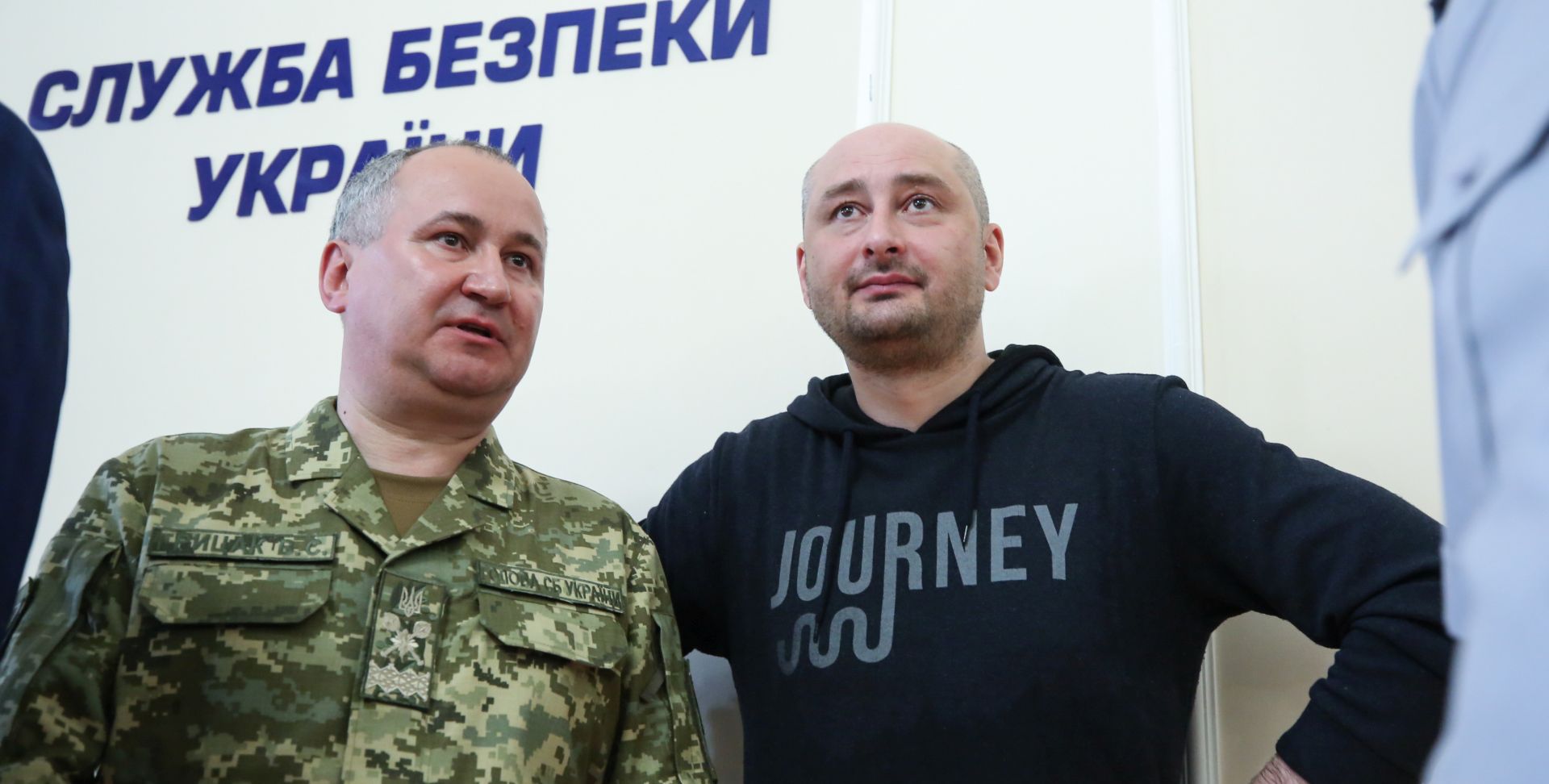 epa06774140 Russian opposition journalist Arkady Babchenko (R) and SBU head Vasiliy Gritsak (L) attend a Ukrainian Security Service (SBU) press conference in Kiev, Ukraine, 30 May 2018. Russian journalist, Putin`s vocal critic Arkady Babchenko is alive and his â€˜assassinationâ€™ was a special operation by the SBU Security Service of Ukraine. The SBU in turn said that its officers had detained a suspect who was engaged in preparations for the contract killing of the journalist.As was reported earlier, Russian opposition journalist Arkady Babchenko was shot dead on 29 May 2018 in his Kiev home by three shots to his back and died from his wounds on the way to hospital. Arkady Babchenko had left Russia in 2017 and since August 2017 he lives in Kiev.  EPA/SERGEY NUZHNENKO