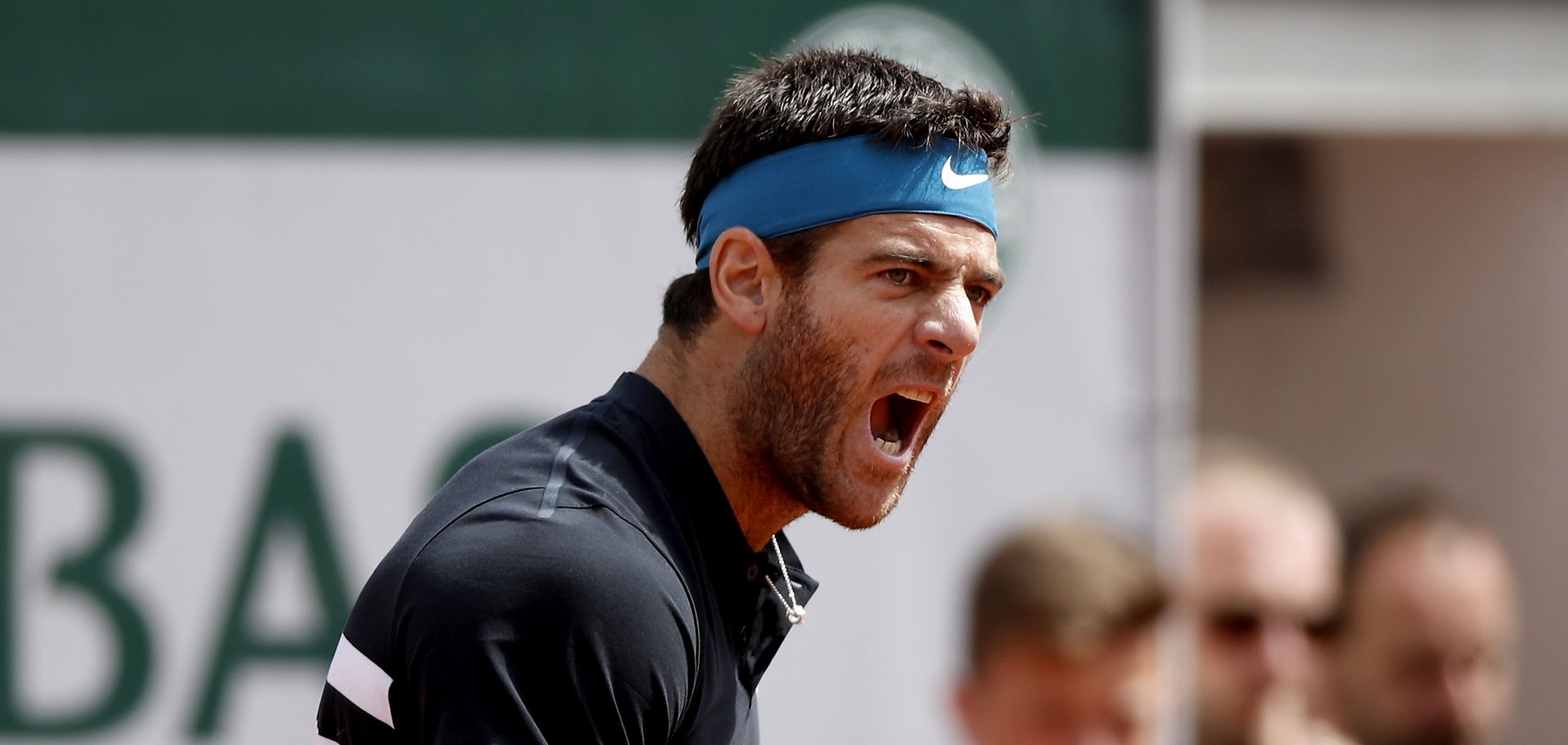 epa06790528 Juan Martin Del Potro of Argentina reacts as he plays Marin Cilic of Croatia during their menâ€™s quarter final match during the French Open tennis tournament at Roland Garros in Paris, France, 07 June 2018.  EPA/YOAN VALAT