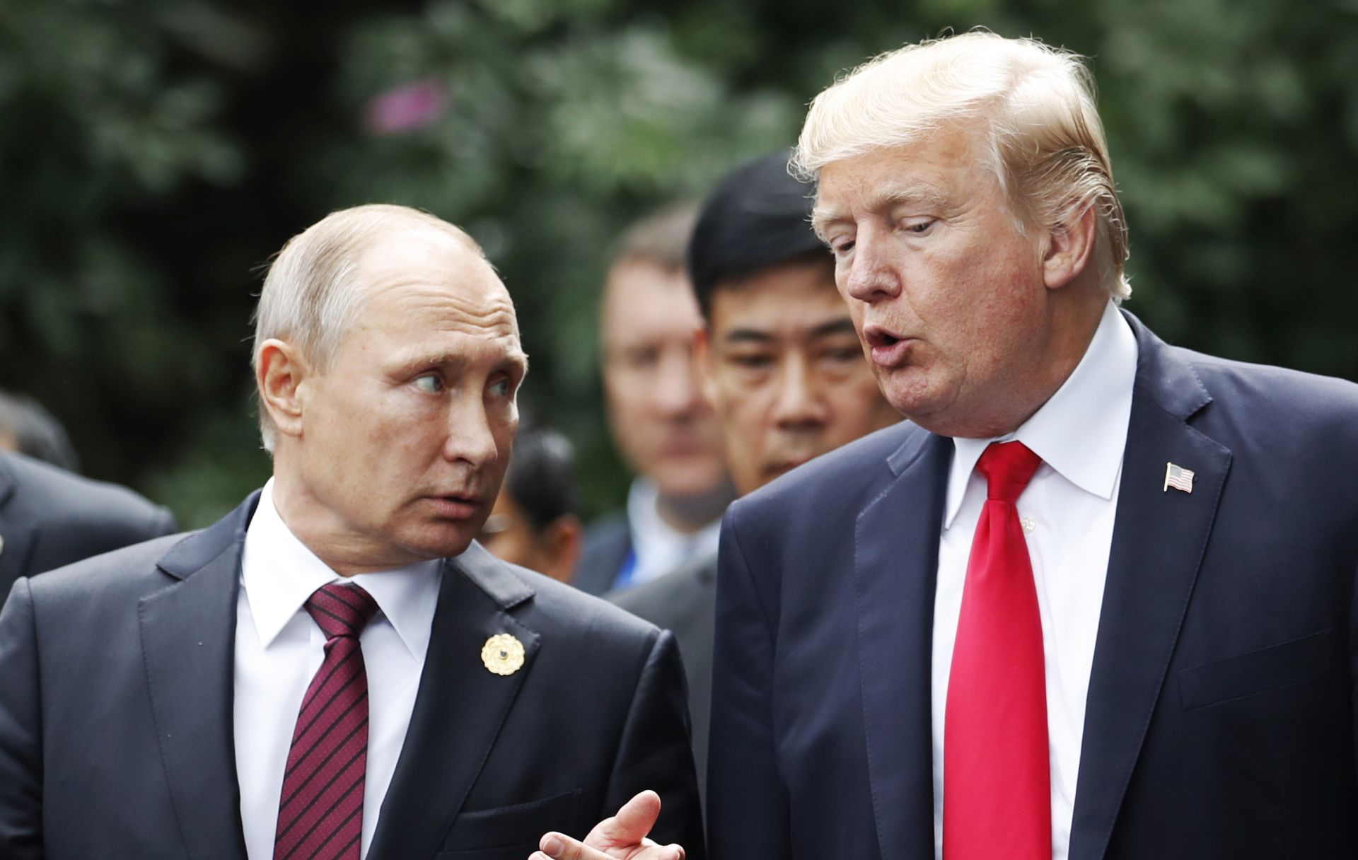epa06847023 (FILE) - US President Donald J. Trump (R) and Russia's President Vladimir Putin talk during a family photo session at the Asia-Pacific Economic Cooperation (APEC) Economic Leaders' Meeting in Da Nang, Vietnam, 11 November 2017 (reissued 28 June 2018). On 28 June 2018, a bilateral meeting of US President Trump and Russian President Putin is confirmed to take place on 16 July 2018 in Helsinki, Finland.  EPA/JORGE SILVA / POOL *** Local Caption *** 53890296