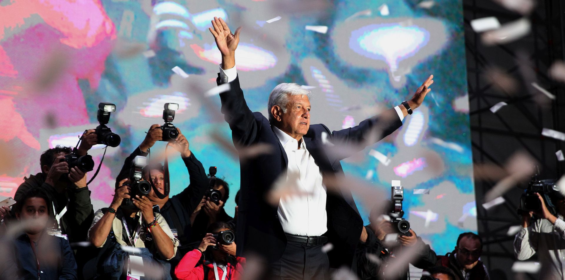 epa06857161 Leftist leader Andres Manuel Lopez Obrador, from Movimiento Regeneracion Nacional (Morena), celebrates his victory with supporters at the Hilton Hotel, located in the historic center of Mexico City, Mexico, 01 July 2018, (issued 02 July 2018). Obrador declared his victory as president of Mexico and thanked his opponents for recognizing his electoral triumph.  EPA/Alex Cruz