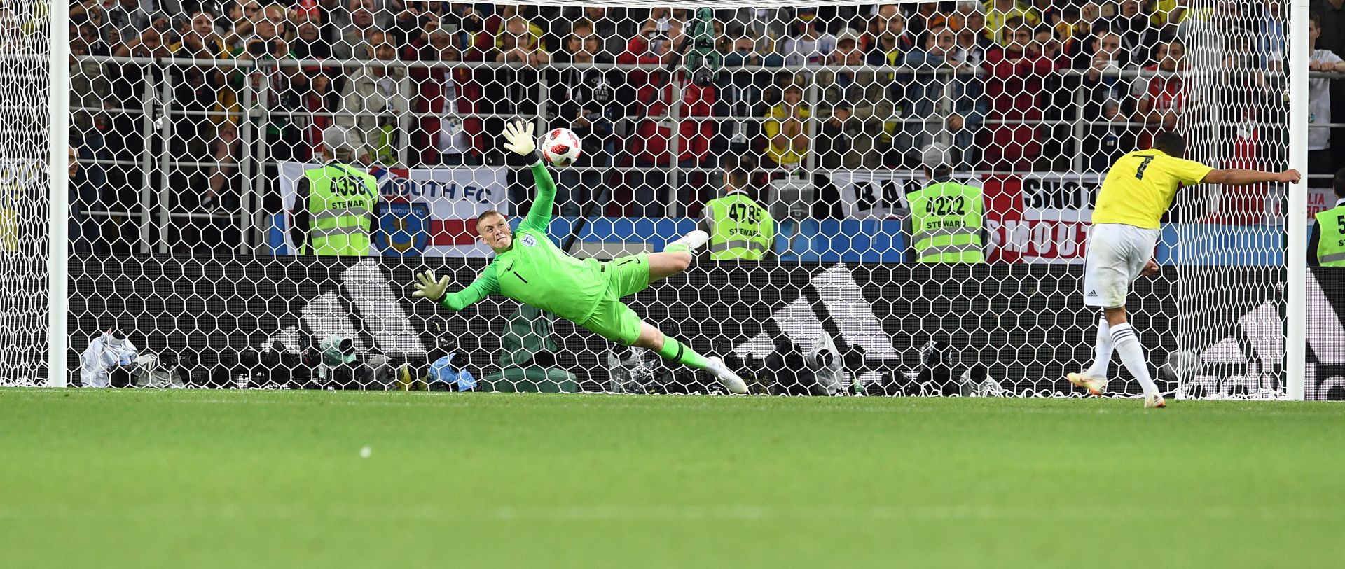 epa06862500 Goalkeeper Jordan Pickford of England saves the penalty of Carlos Bacca of Colombia during the penalty shootout during the FIFA World Cup 2018 round of 16 soccer match between Colombia and England in Moscow, Russia, 03 July 2018.

(RESTRICTIONS APPLY: Editorial Use Only, not used in association with any commercial entity - Images must not be used in any form of alert service or push service of any kind including via mobile alert services, downloads to mobile devices or MMS messaging - Images must appear as still images and must not emulate match action video footage - No alteration is made to, and no text or image is superimposed over, any published image which: (a) intentionally obscures or removes a sponsor identification image; or (b) adds or overlays the commercial identification of any third party which is not officially associated with the FIFA World Cup)  EPA/FACUNDO ARRIZABALAGA   EDITORIAL USE ONLY