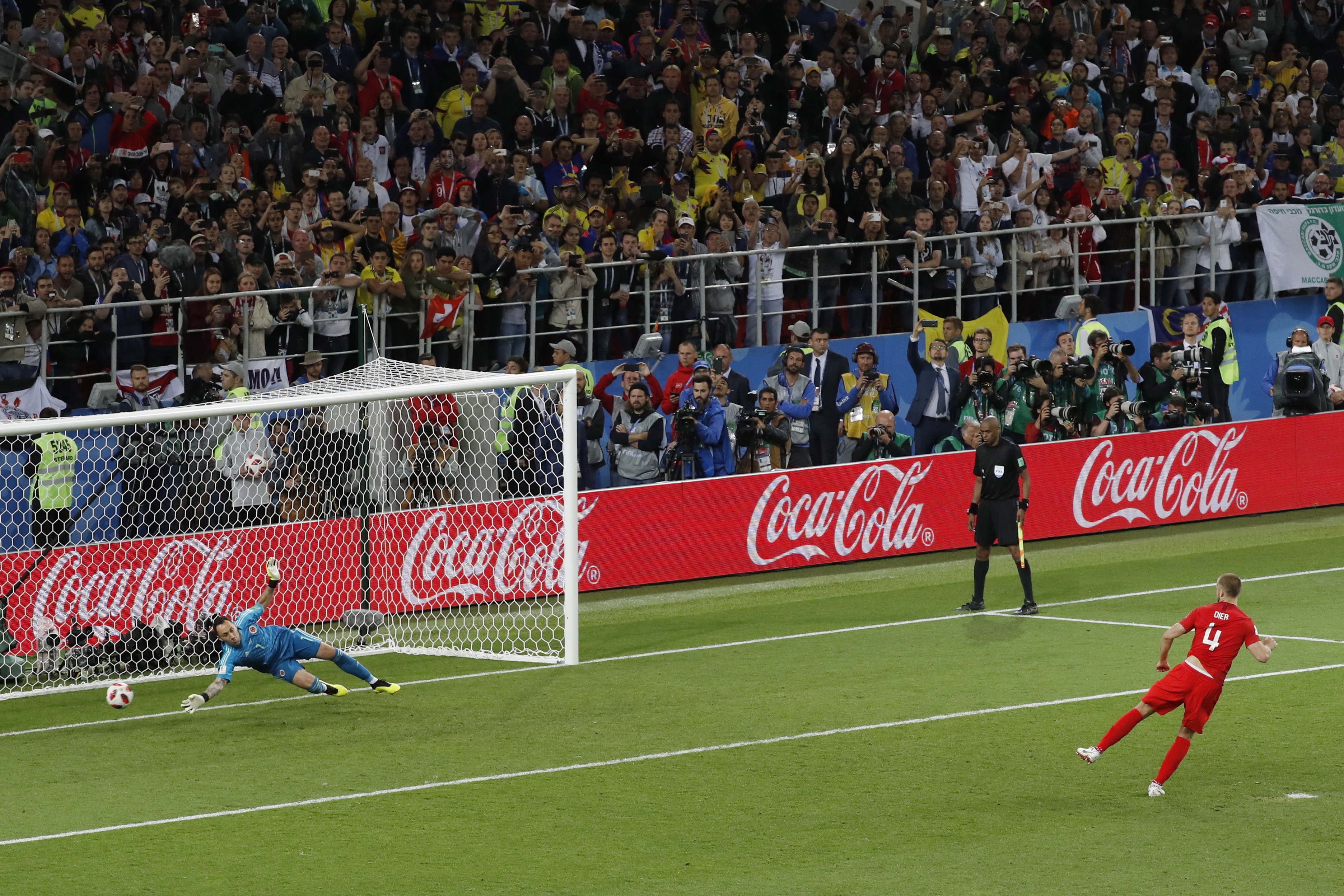 epa06862511 Eric Dier (R) of England score the winning goal during the penalty shootout of the FIFA World Cup 2018 round of 16 soccer match between Colombia and England in Moscow, Russia, 03 July 2018.

(RESTRICTIONS APPLY: Editorial Use Only, not used in association with any commercial entity - Images must not be used in any form of alert service or push service of any kind including via mobile alert services, downloads to mobile devices or MMS messaging - Images must appear as still images and must not emulate match action video footage - No alteration is made to, and no text or image is superimposed over, any published image which: (a) intentionally obscures or removes a sponsor identification image; or (b) adds or overlays the commercial identification of any third party which is not officially associated with the FIFA World Cup)  EPA/FELIPE TRUEBA   EDITORIAL USE ONLY  EPA-EFE/FELIPE TRUEBA   EDITORIAL USE ONLY
