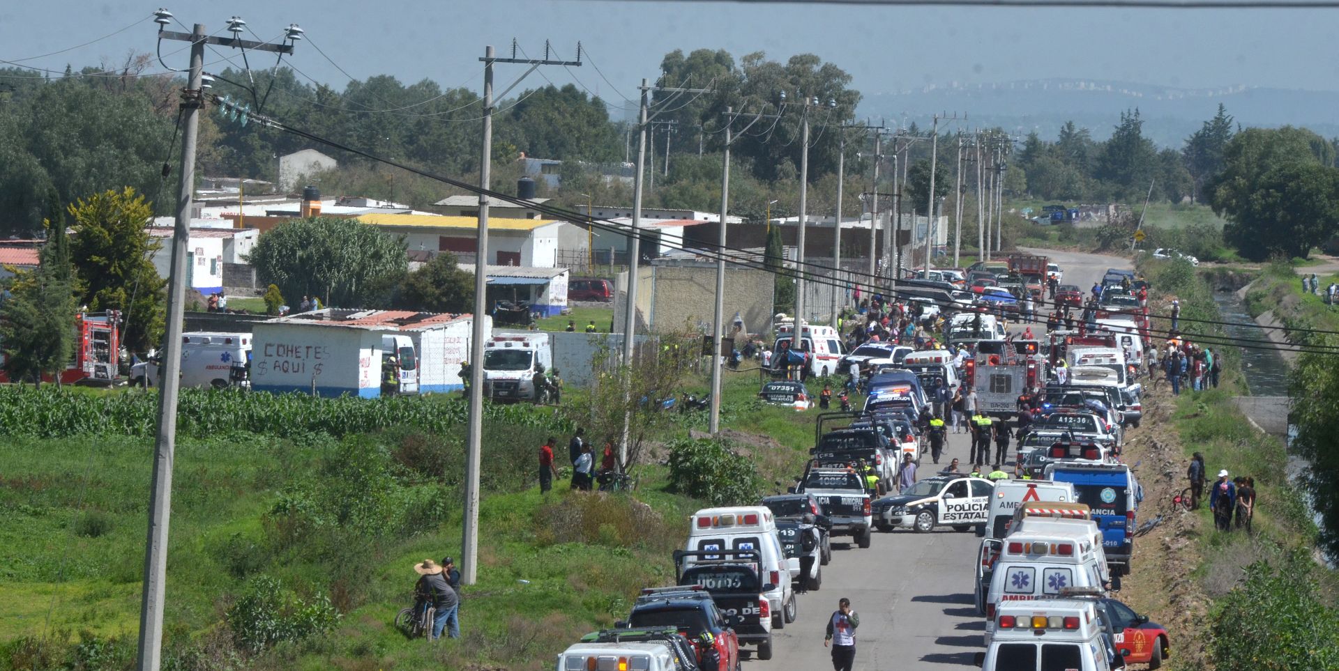 epa06866691 General view of the area where at least 19 died in an explosion, in Tultepec, Mexico, 05 July 2018. At least 19 died and 40 were wounded in an explosion at a fireworks workshop in Tultepec.  EPA/STR
