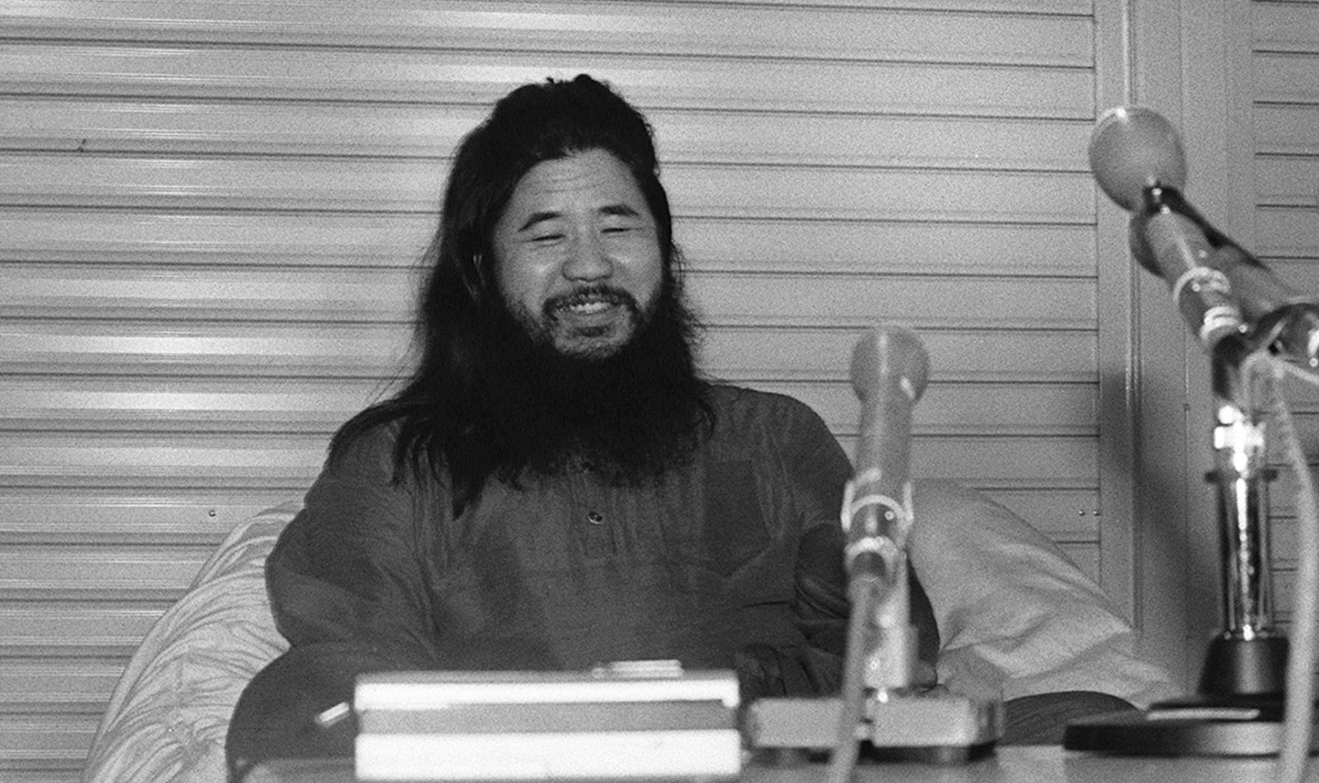epa06866856 (FILE) - A black and white file photo taken on 22 October 1990, shows cult Aum Shinrikyo founder Shoko Asahara speaking at his cult headquarters in Fujinomiya, Shizuoka Prefecture, Japan (issued 06 July 2018). According to media reports, Matsumoto was executed in Tokyo on 06 July 2018. The doomsday cult leader Matsumoto was convicted for the group's nerve gas attack on Tokyo subway in March 1995, killing 13 people and injuring thousands of people.  EPA/JIJI PRESS JAPAN OUT EDITORIAL USE ONLY  NO ARCHIVES