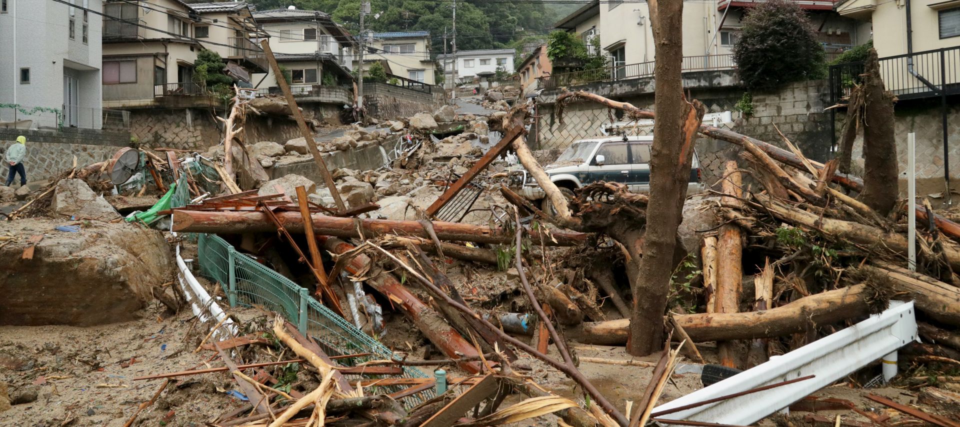 epa06873708 Flood by heavy rain damage a residential district in Hiroshima, Hiroshima Prefecture, western Japan, 08 July 2018. Heavy rainfall killed 81 people and missing 58 people at least in southwestern and western Japan, public television reported on 08 July 2018. Japan Meteorological Agency has warned record rainfall on 06 July for flooding, mudslides in southwestern and western Japan through 08 July and issued emergency weather warnings to six prefectures. In nine prefectures in western and southwestern Japan,  authorities issued evacuation orders to more than for million of people in southwestern and western Japan.  EPA/JIJI PRESS JAPAN OUT  EDITORIAL USE ONLY/NO SALES