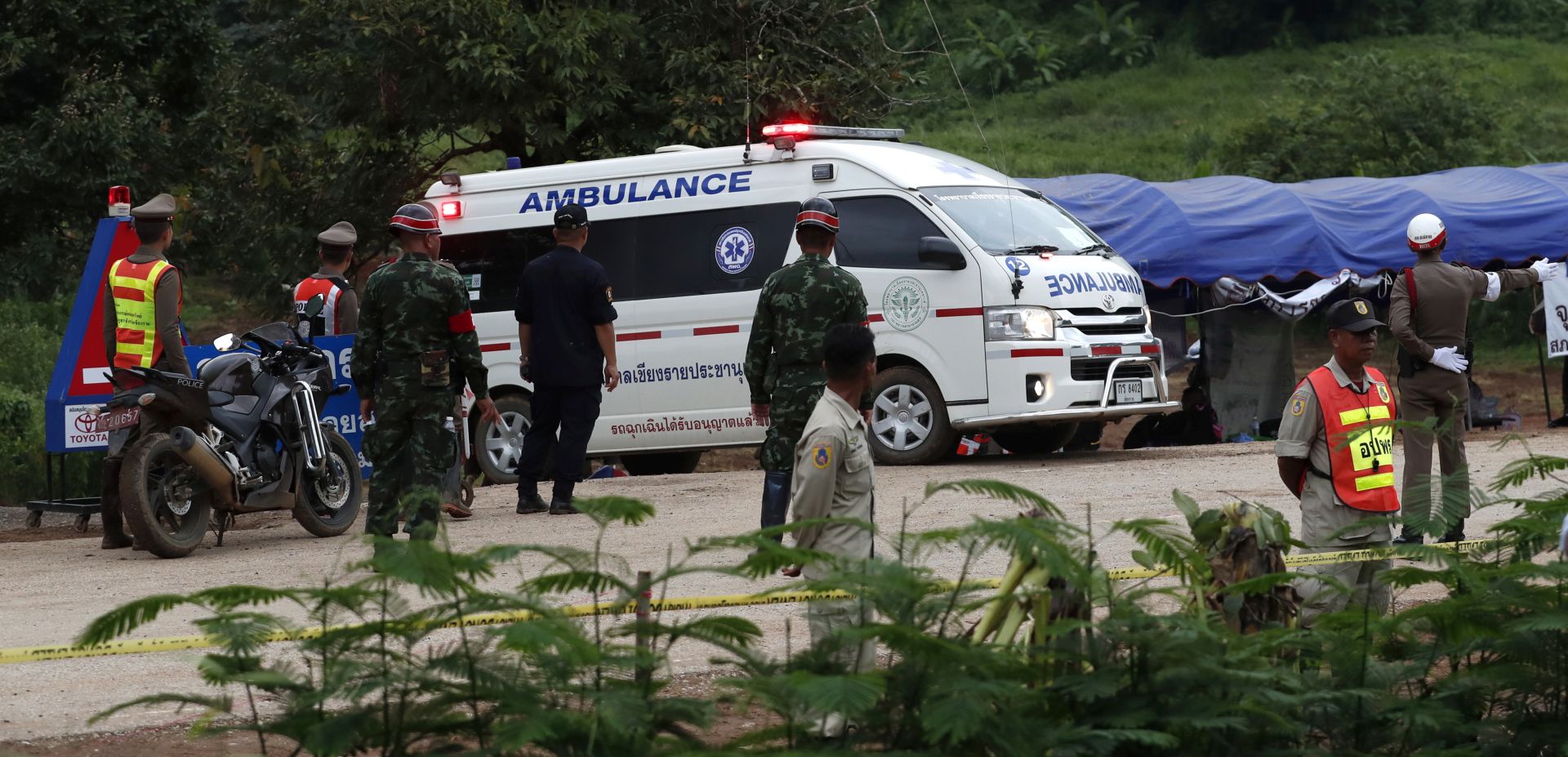 epa06877718 An ambulance evacuates a cave trapped boy to hospital after he was rescued from the Tham Luang cave, Khun Nam Nang Non Forest Park in Chiang Rai province, Thailand, 10 July 2018. According to reports, all 12 boys of a child soccer team and their assistant coach have been rescued and evacuated to a hospital, 13 members of a youth soccer team including their assistant coach have been trapped in Tham Luang cave since 23 June 2018.  EPA/RUNGROJ YONGRIT