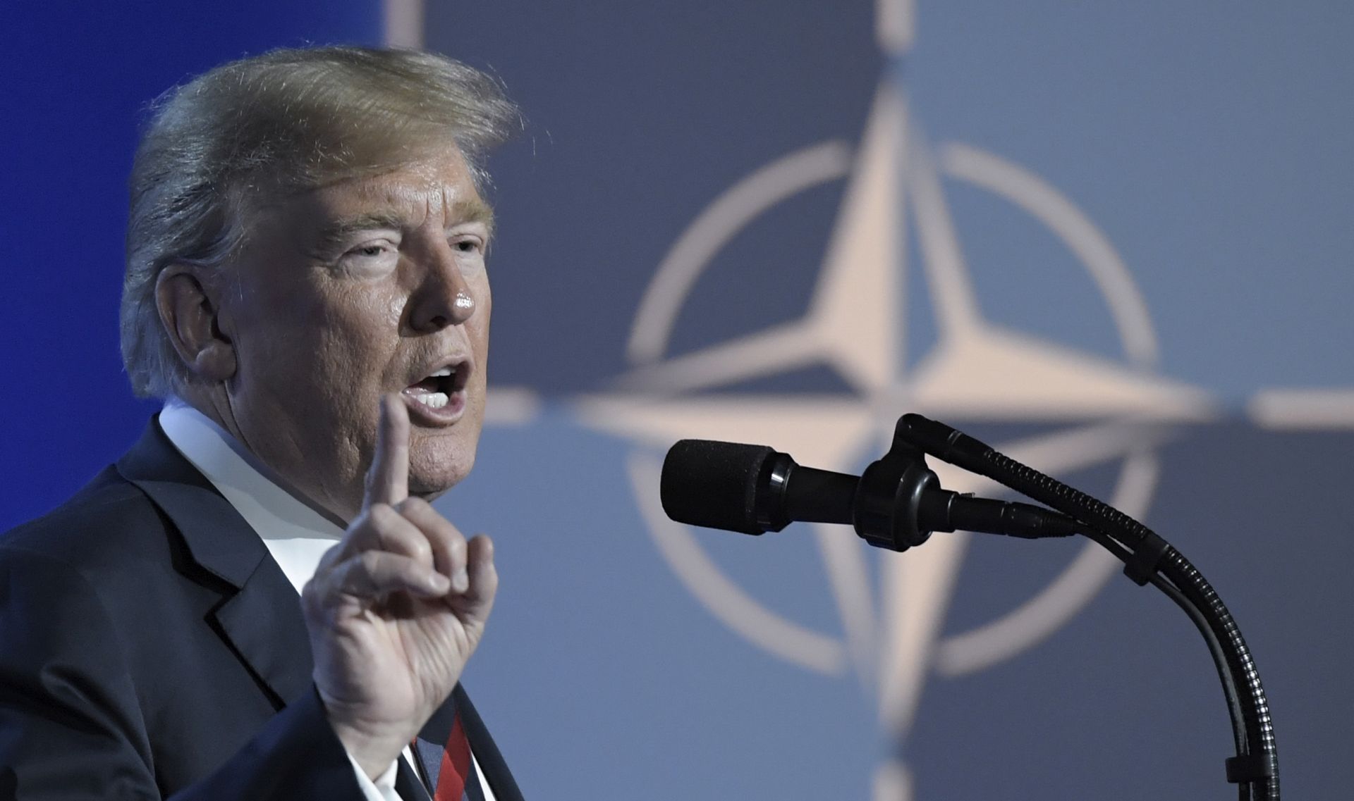 epa06883146 US President Donald Trump during a press conference at the Nato Summit in Brussels, Belgium, 12 July 2018. NATO member countries' heads of states and governments gather in Brussels on 11 and 12 July 2018 for a two days meeting.  EPA/CHRISTIAN BRUNA