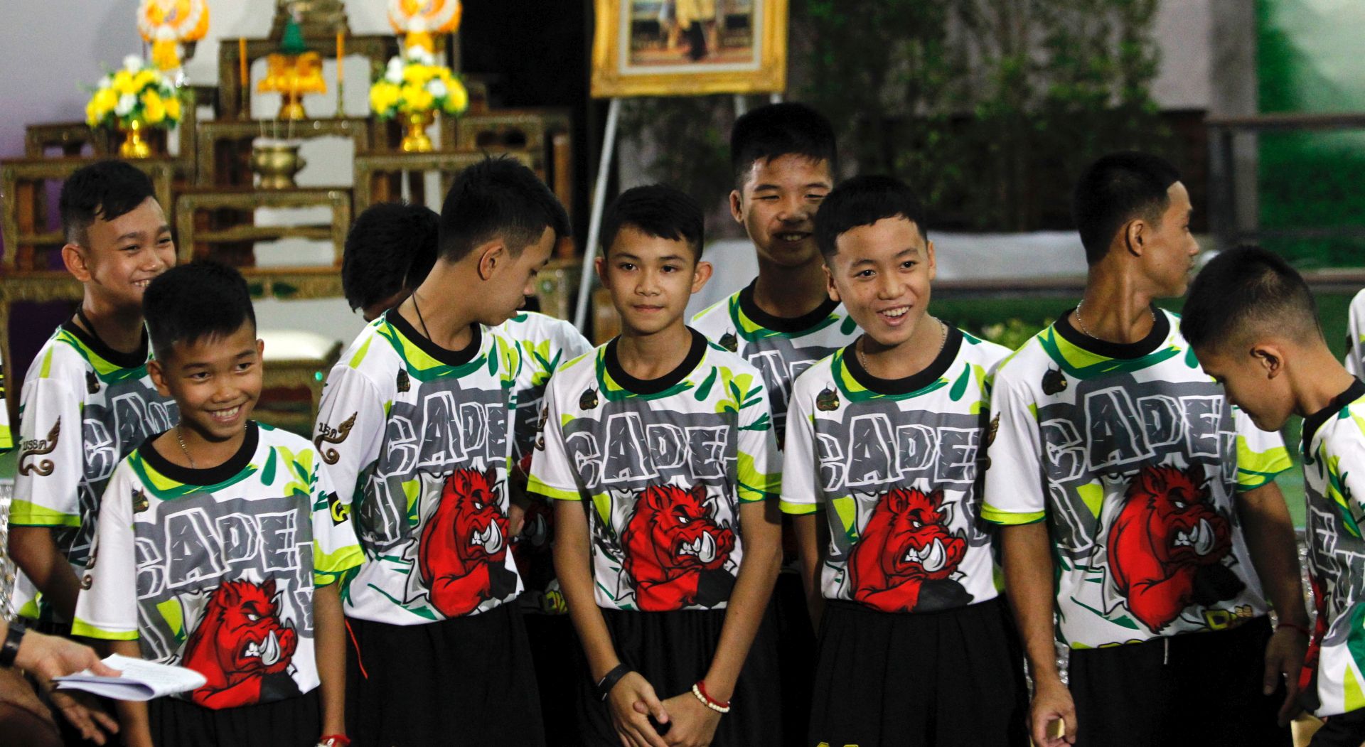 epa06896341 Some of the 12 members of the Wild Boar soccer team, who were rescued from the Tham Luang cave, make their first appearance to media during a military governmental TV pool broadcasting program at Chiang Rai Provincial Administrative Organization in Chiang Rai province, Thailand, 18 July 2018. The thirteen members of Wild Boar child soccer team, including their assistant coach, who were trapped in the Tham Luang cave since 23 June 2018, made their first appearance on the day for a tightly-controlled interview with the media after they were rescued, before returning to their homes with families.  EPA/PONGMANAT TASIRI