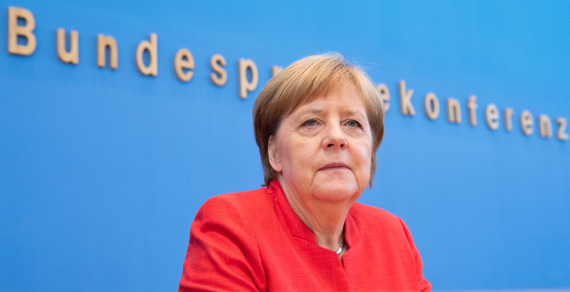 epa06899791 German Chancellor Angela Merkel arrives for her annual press conference at 'Bundespressekonferenz' in Berlin, Germany, 20 July 2018. The traditional media briefing usually takes place during summer time.  EPA/HAYOUNG JEON