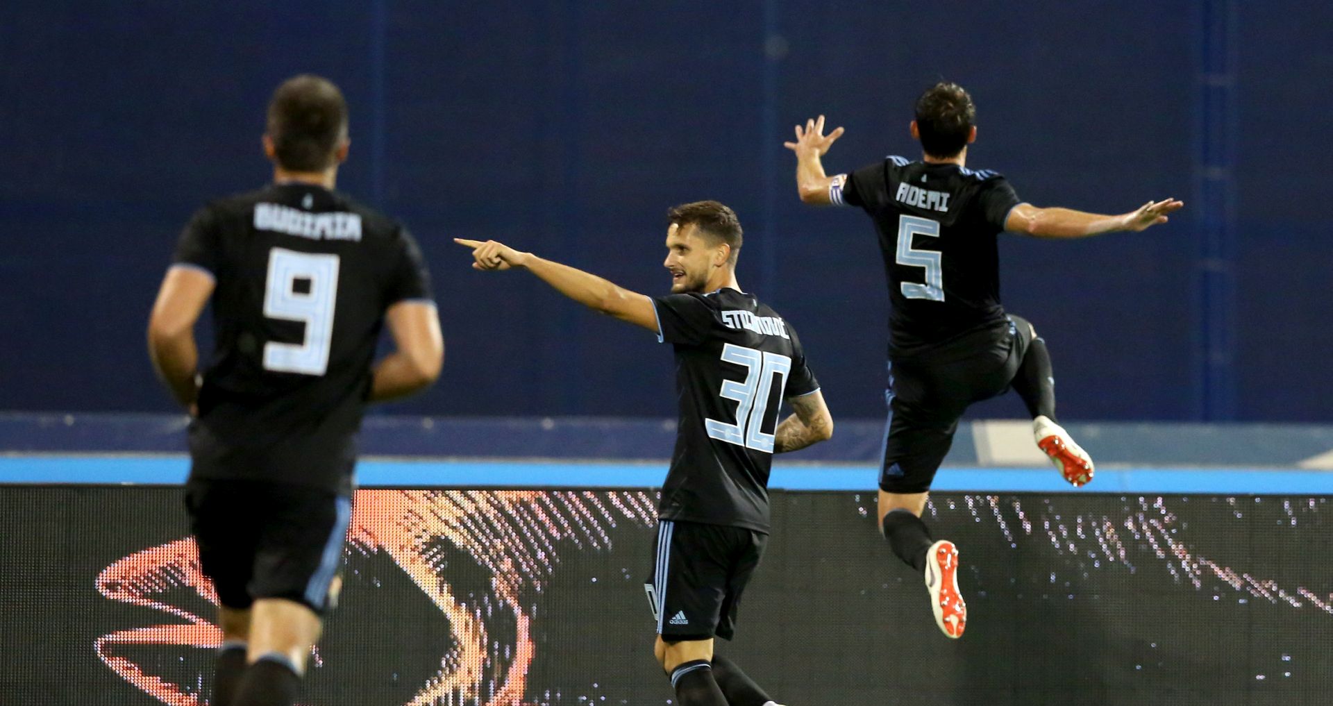 Zagreb, 24.7.2018. - Prva utakmica 2. pretkola nogometne Lige prvaka Dinamo - Hapoel Beer Sheva. Na fotografiji Mario Budimir, Petar Stojanović, Arijan Ademi. foto HINA/ Daniel KASAP/ dk