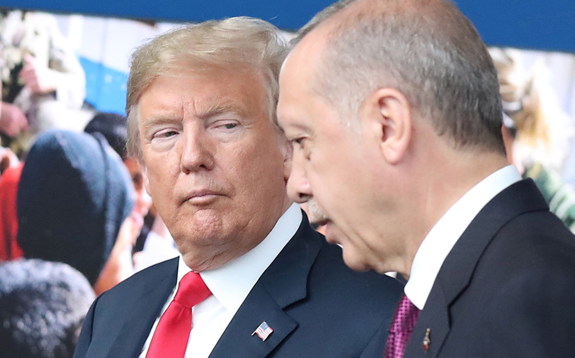 epa06943382 (FILE) - US President Donald J. Trump (L) looks at Turkey's President Recep Tayyip Erdogan (R) at NATO headquarters in Brussels, Belgium, 11 July 2018 (reissued 11 August 2018). Turkish President Erdogan condemned US President Trump's doubling of tariffs on Turkish steel and aluminium imports up to 50 percent. The Turkish lira plunged over 20 percent against the US dollar after Trump's announcement on 10 August 2018, which has been exacerbated over the disputed imprisonment of US pastor Andrew Brunson in Turkey.  EPA/TATYANA ZENKOVICH
