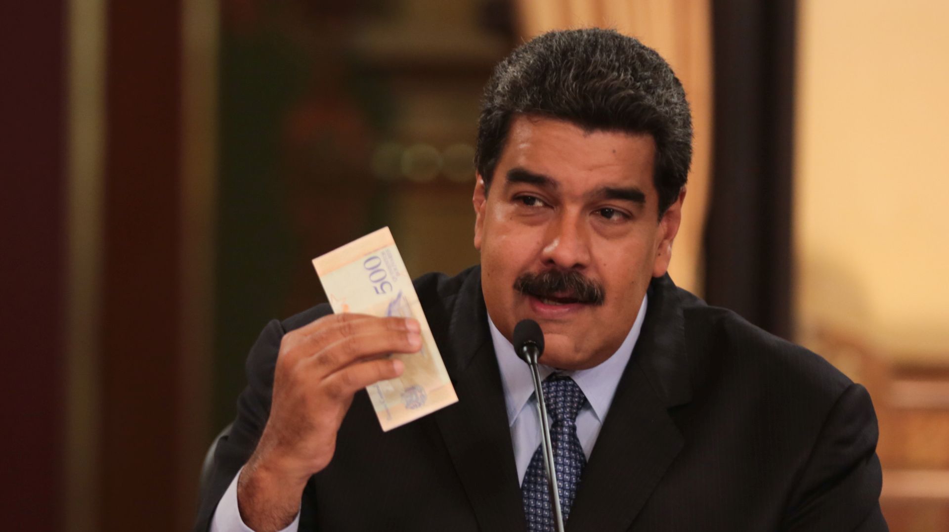 epa06955344 A handout photo made available by the Miraflores Press Office shows Venezuelan President Nicolas Maduro during a mandatory radio and television broadcast in Caracas, Venezuela, 17 August 2018. Maduro increased the minimum wage of the workers by raising it up to a price 35 times higher than the current one, according to the official reference rates in the country. The salary will go up from 5,196,000 bolivars to 180,000,000, an amount that will be expressed in 'sovereign' bolivars, that goes into effect on 20 August, when a reconversion will come into force removing five zeros from the currency.  EPA/MIRAFLORES PRESS HANDOUT  HANDOUT EDITORIAL USE ONLY/NO SALES