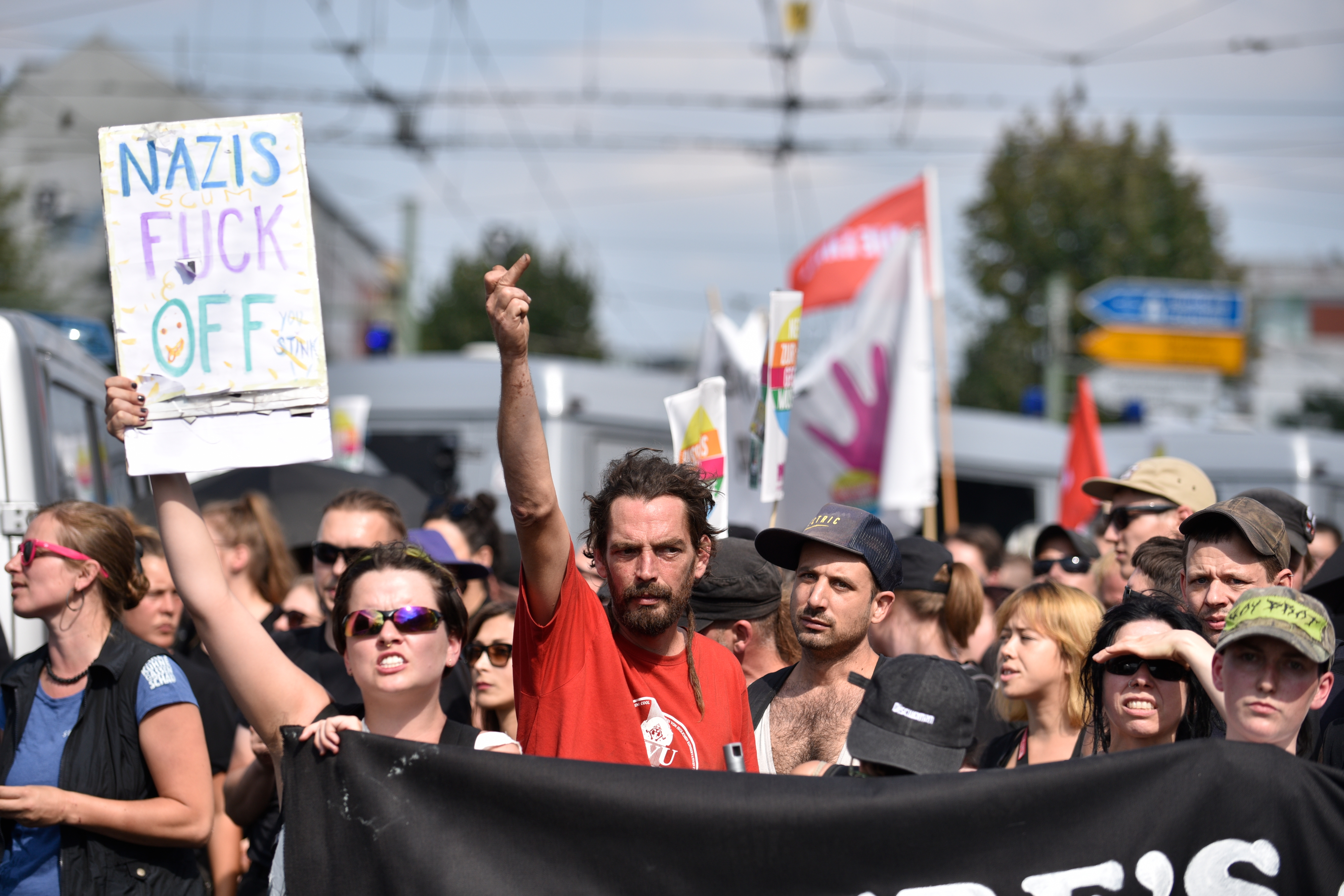epa06956152 Counter-protesters attend a demonstration against a gathering of far-right organizations commemorating the death anniversary Rudolf Hess in the district of Spandau in Berlin, Germany, 18 August 2018. Hess died on 17 August 1987 after committing suicide in the Spandau Prison, where he served his life sentence. Hess was one of the most prominent Nazi leaders and appointed Deputy Fuehrer by German dictator Adolf Hitler in 1933.  EPA/MARKUS HEINE