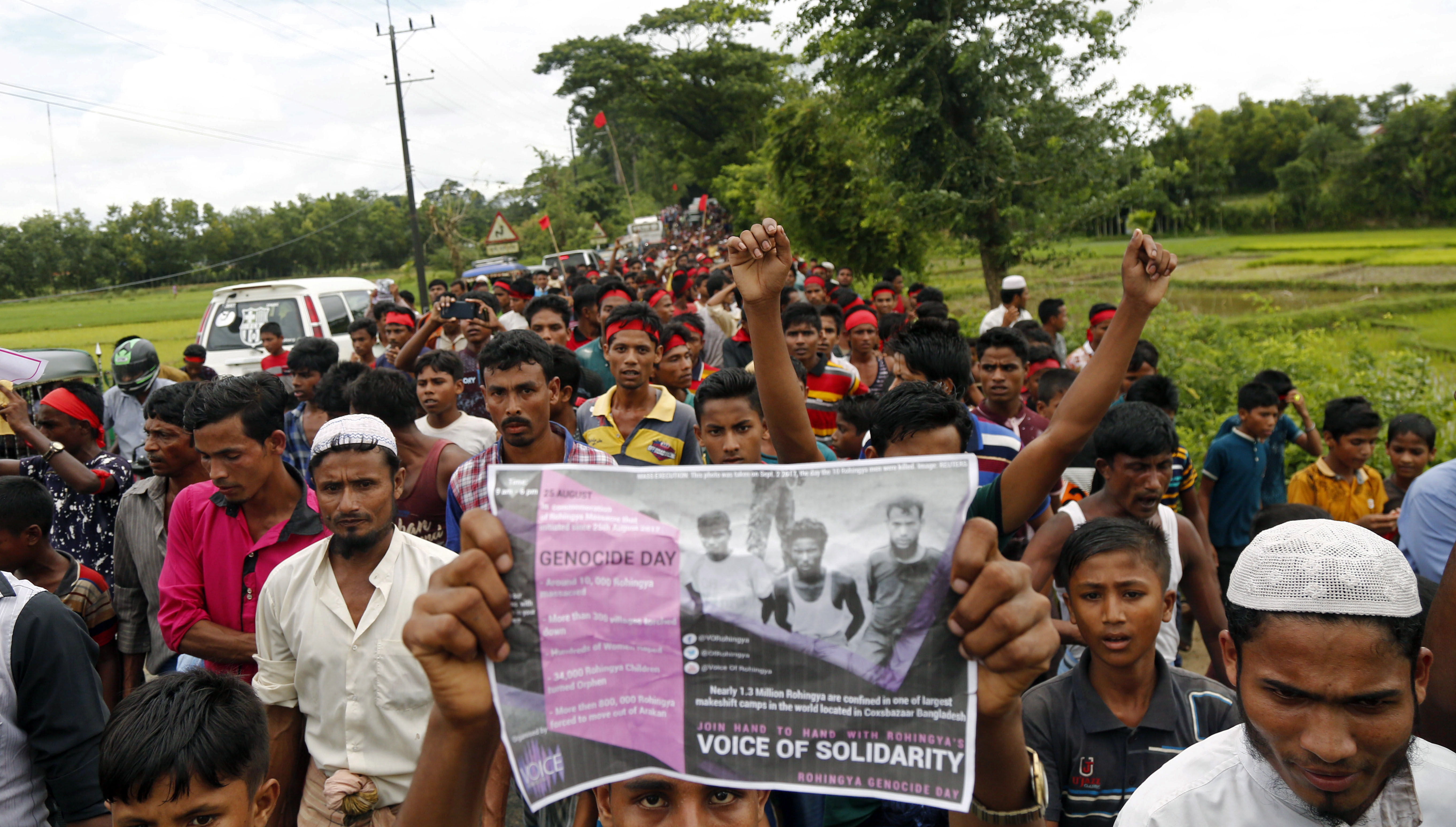 epa06970359 A group of Rohingya refugees participate in a protest on Rohingya Genocide Remembrance Day on a road in Teknuf, Cox's Bazar, Bangladesh, 25 August 2018. The 25th of August 2018 marks the first anniversary of the Rohingya crisis. On 25 August 2017 the Myanmar military launched a military operation in Rakhine State in response to attacks by the Arakan Rohingya Salvation Army (ARSA) on government posts in the region. The army unleashed a large military campaign that drove around 700,000 Rohingya people to flee across the border to Bangladesh.  EPA/MONIRUL ALAM