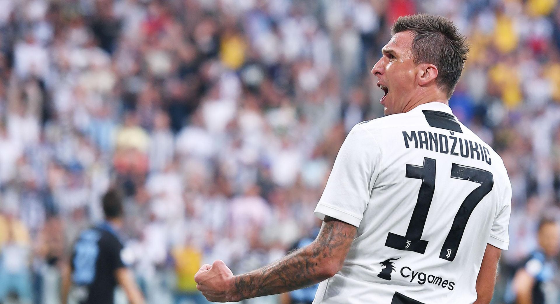 epa06972451 Juventus' Mario Mandzukic celebrates scoring during the Italian Serie A soccer match between Juventus FC and SS Lazio at the Allianz Stadium in Turin, Italy, 25 August 2018.  EPA/ALESSANDRO DI MARCO