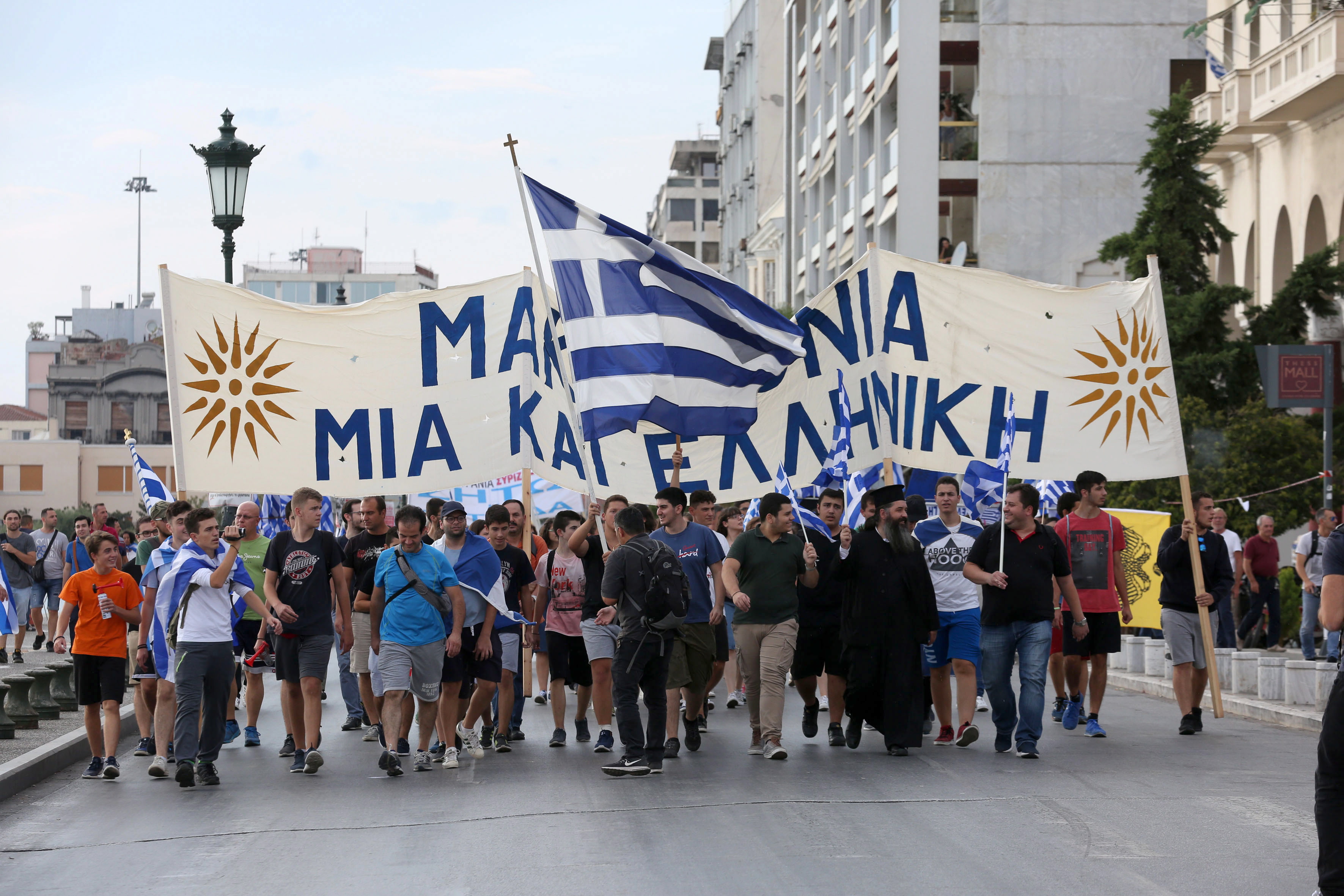 epa07005923 People protest against the name â€˜Northern Macedoniaâ€™ for the Skopje balkan country at a rally during the 83rd Thessaloniki International Fair, Thessaloniki, Greece, 08 September 2018.  EPA/ORESTIS PANAGIOTOU