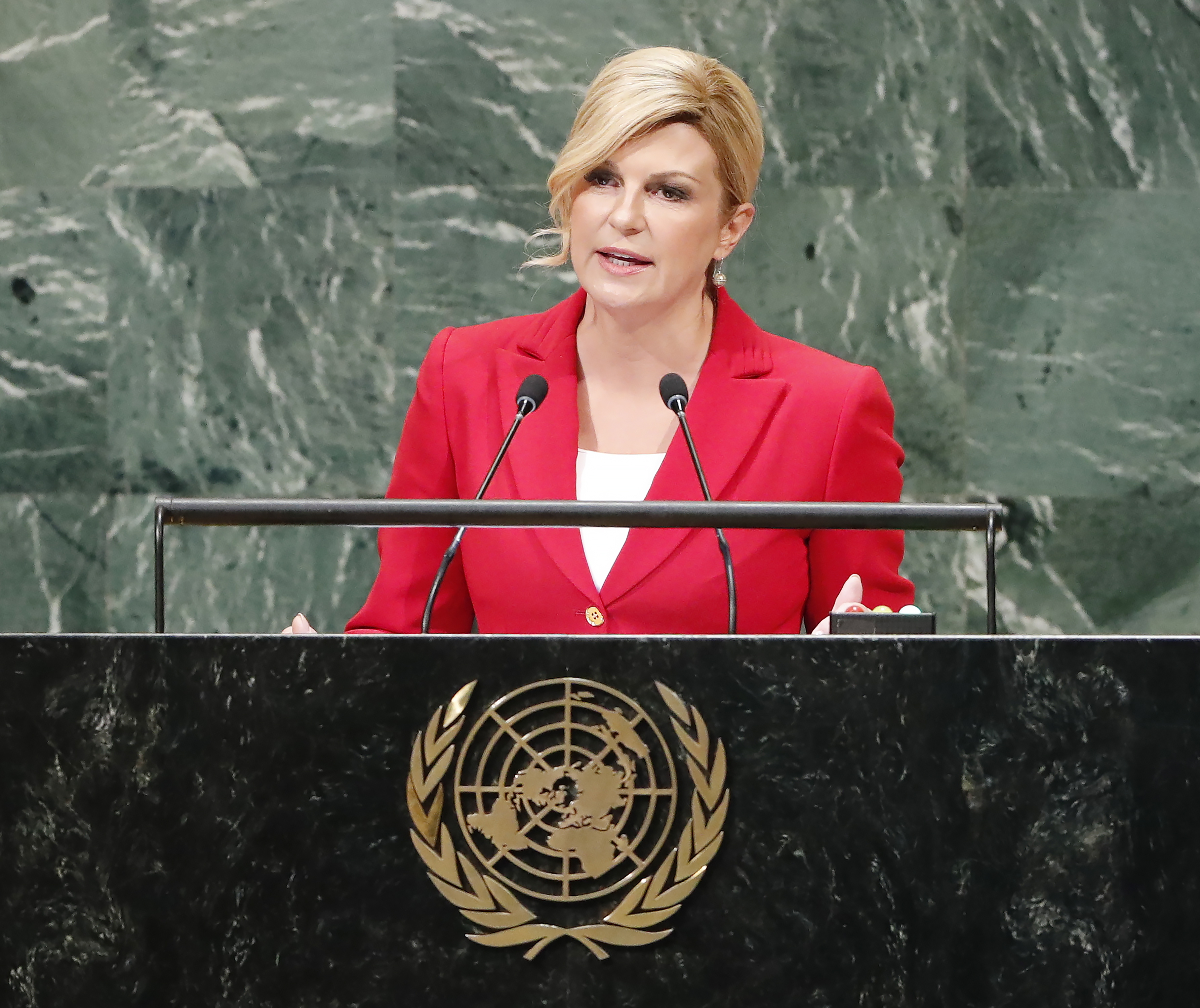 epa07048422 Croatian President Kolinda Grabar-Kitarovic speaks during the General Debate of the General Assembly of the United Nations at United Nations Headquarters in New York, New York, USA, 26 September 2018. The General Debate of the 73rd session began on 25 September 2018.  EPA/JASON SZENES