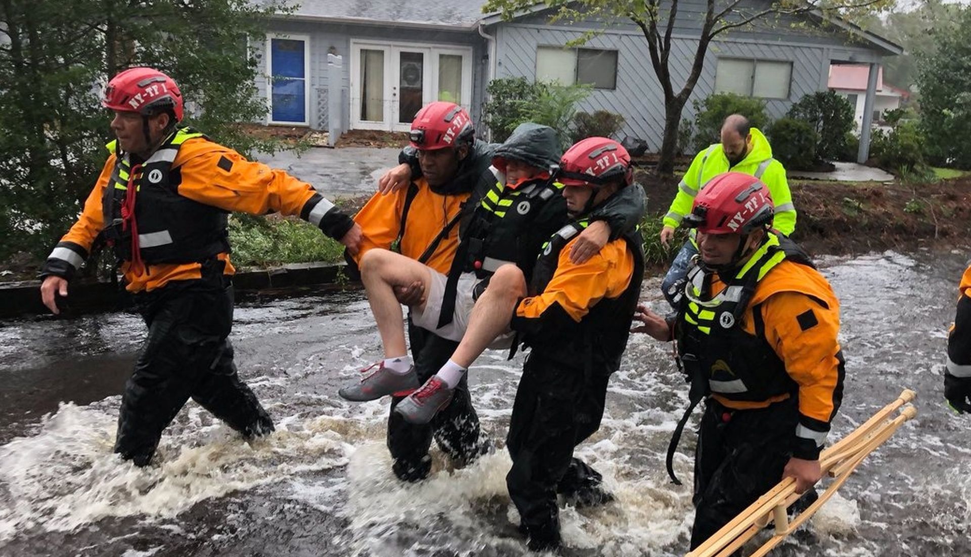 Search and Rescue workers from New York rescue a man from flooding caused by Hurricane Florence in River Bend Search and Rescue workers from New York rescue a man from flooding caused by Hurricane Florence in River Bend, North Carolina, U.S. in this September 14, 2018 handout photo.   NYC Emergency Management/Handout via REUTERS  ATTENTION EDITORS - THIS IMAGE WAS PROVIDED BY A THIRD PARTY. HANDOUT