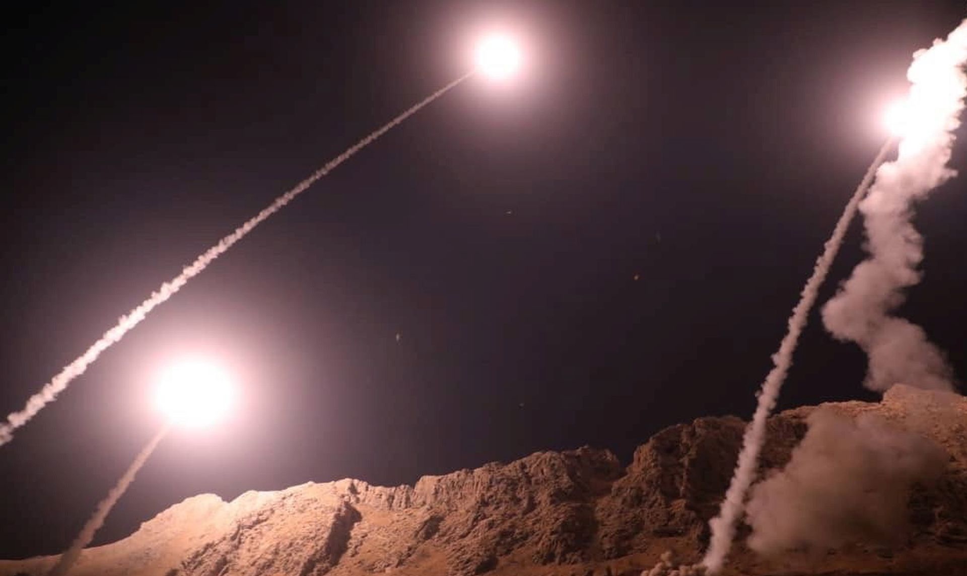 epa07060767 A handout photo made available by Irans Revolutionary Guard official website showing missiles being launches from an undisclosed location targeting the Islamic state group group in eastern Syria, 01 October 2018. Media reports state that the attack came after a recent terror attack on a military parade in city of Ahvaz southern Iran, which killed at least 25 people and wounded others.  EPA/SEPAHNEWS / HANDOUT  HANDOUT EDITORIAL USE ONLY/NO SALES