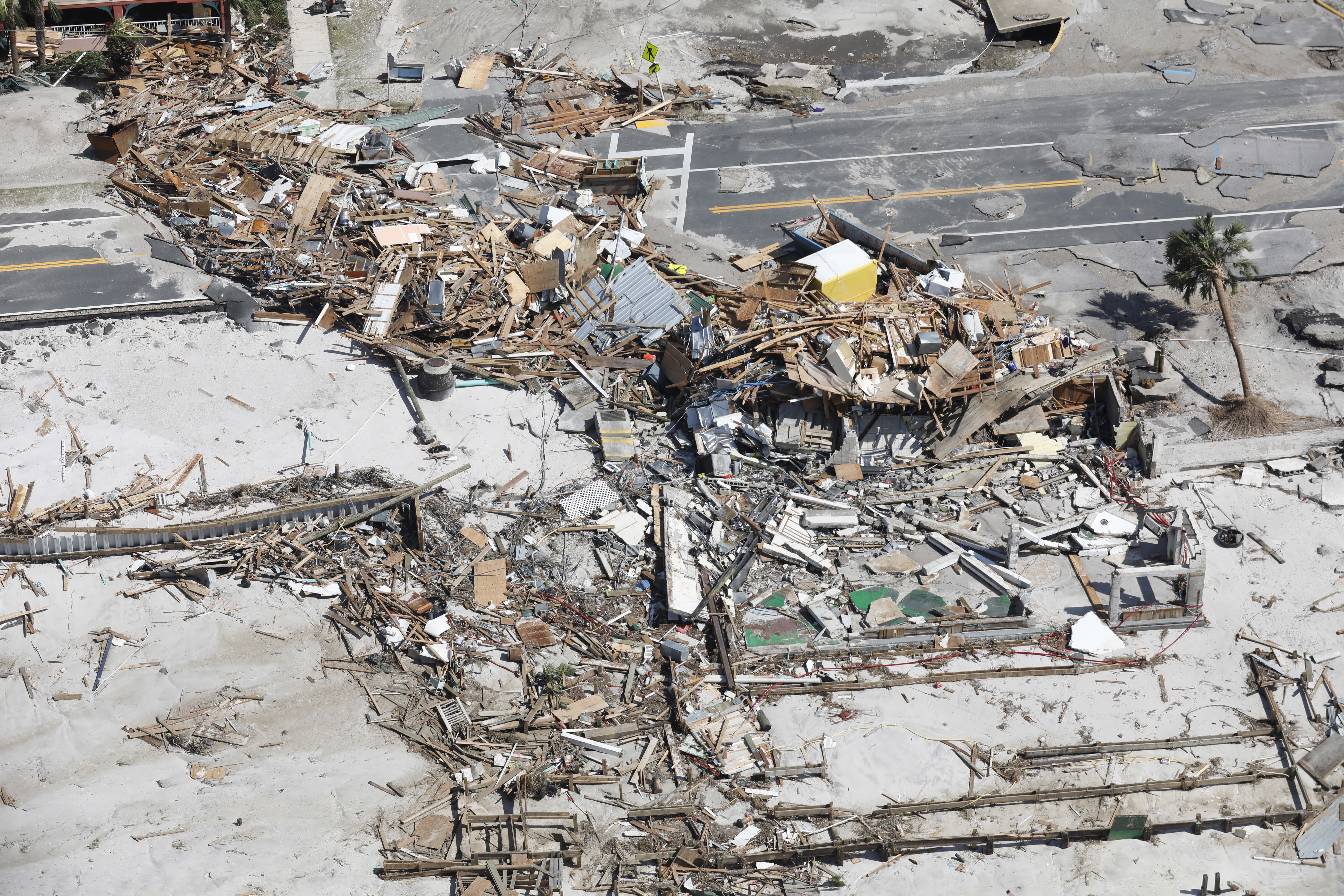 epa07089099 Handout image released by the U.S. Customs and Border Protection showing a CBP Air and Marine Operations UH-60 Black Hawk flight crew conducting search and rescue operations in the aftermath of Hurricane Michael among damaged homes and flooding in Panama City, Florida, USA, 11 October 2018 (issued 12 October 2018). Category 4 storm Hurricane Michael devastated northwestern Florida with winds of up to 155 miles (250 kilometers) per hour and flooding.  EPA/GLENN FAWCETT / CUSTOMS AND BORDER PROTECTION / HANDOU  HANDOUT EDITORIAL USE ONLY/NO SALES