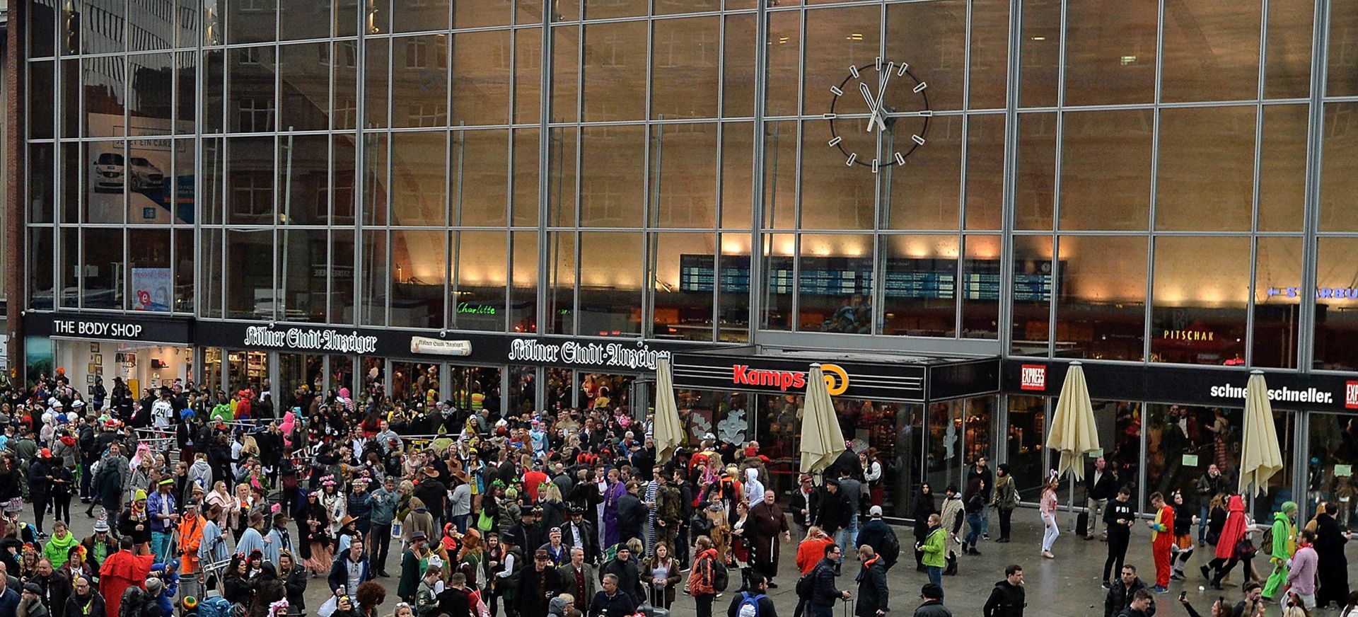 epa07094635 (FILE) - Costumed revellers celebrate carnival despite the rain in front of the main train station in Cologne, Germany, 23 February 2017 (reissued 15 October 2018). According to reports, police is responding to a hostage situation near Cologne's central station on 15 October 2018.  EPA/SASCHA STEINBACH *** Local Caption *** 53346539