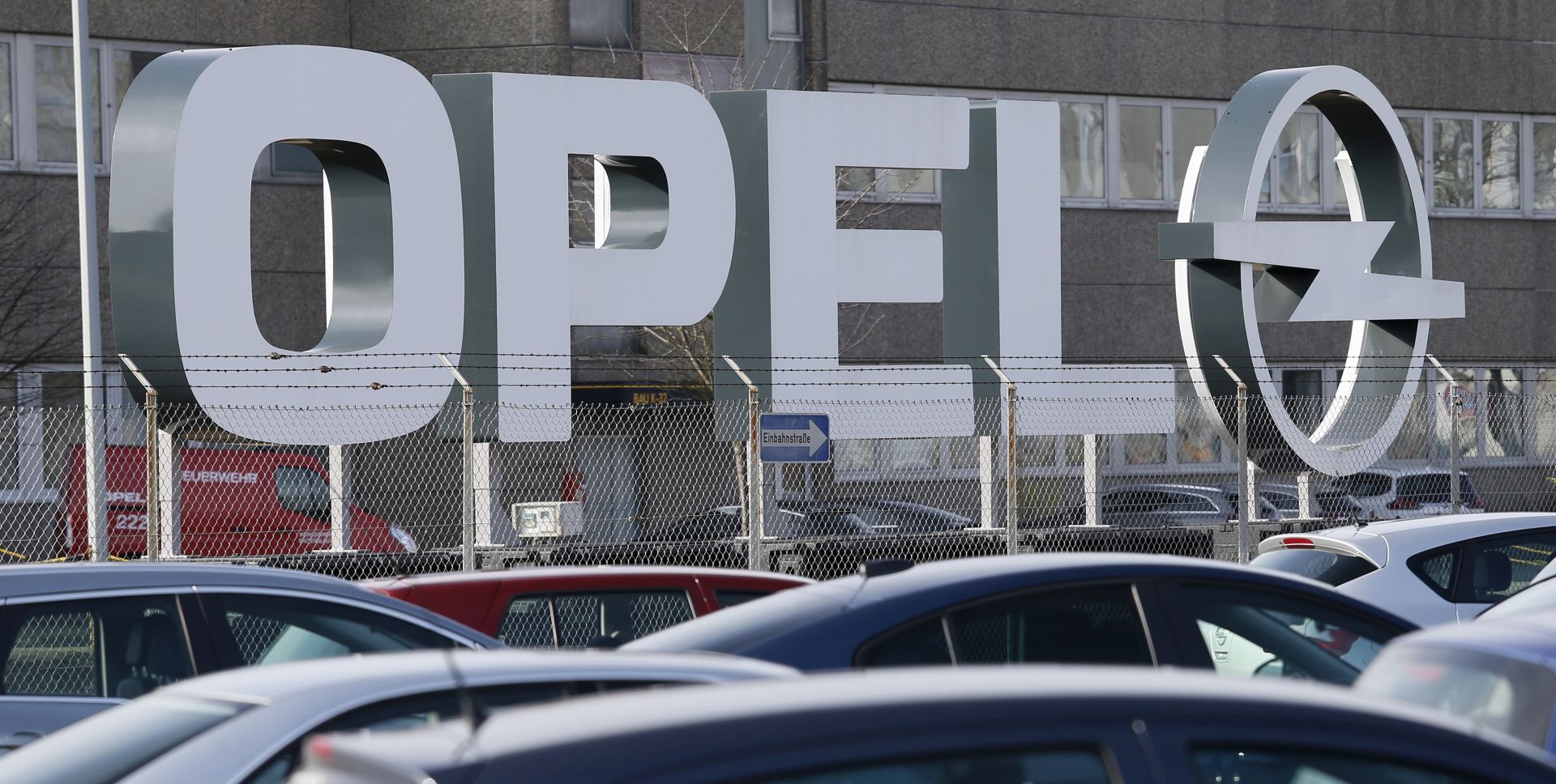 epa07094533 (FILE) - An Opel logo in front of a factory of the German Opel car company in Kaiserslautern, Germany, 08 March 2017 (reissued 15 October 2018). According to media reports, police searched Opel offices in Karlsruhe and Ruesselsheim in connection with investigations on emissions.  EPA/RONALD WITTEK