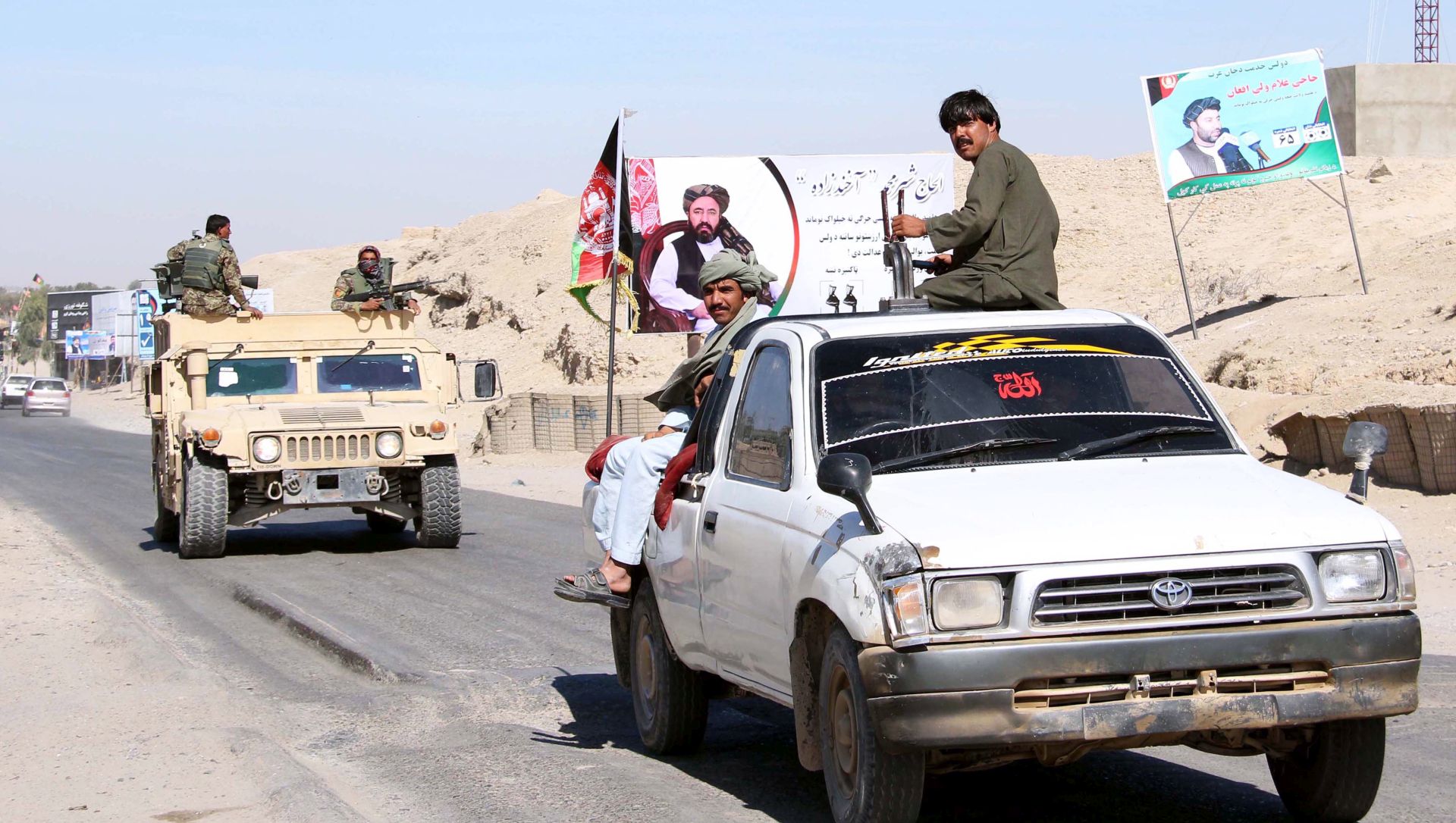 epa07102997 Afghan security officials check vehicles on a road side as security has been intensified ahead of parliamentary elections in Helmand, Afghanistan, 18 October 2018. More than 2,500 candidates are running for the 249 seats in the Afghan Parliament, with the October 20 elections denounced by insurgents as a flawed process aimed at legitimizing the presence of foreign troops in Afghanistan. The Afghan government has deployed 54,000 soldiers to secure the peace during the polls, but 2,384 of the 7,384 polling stations are in areas under Taliban control and will remain closed on election day, according to the country's Independent Election Commission.  EPA/WATAN YAR