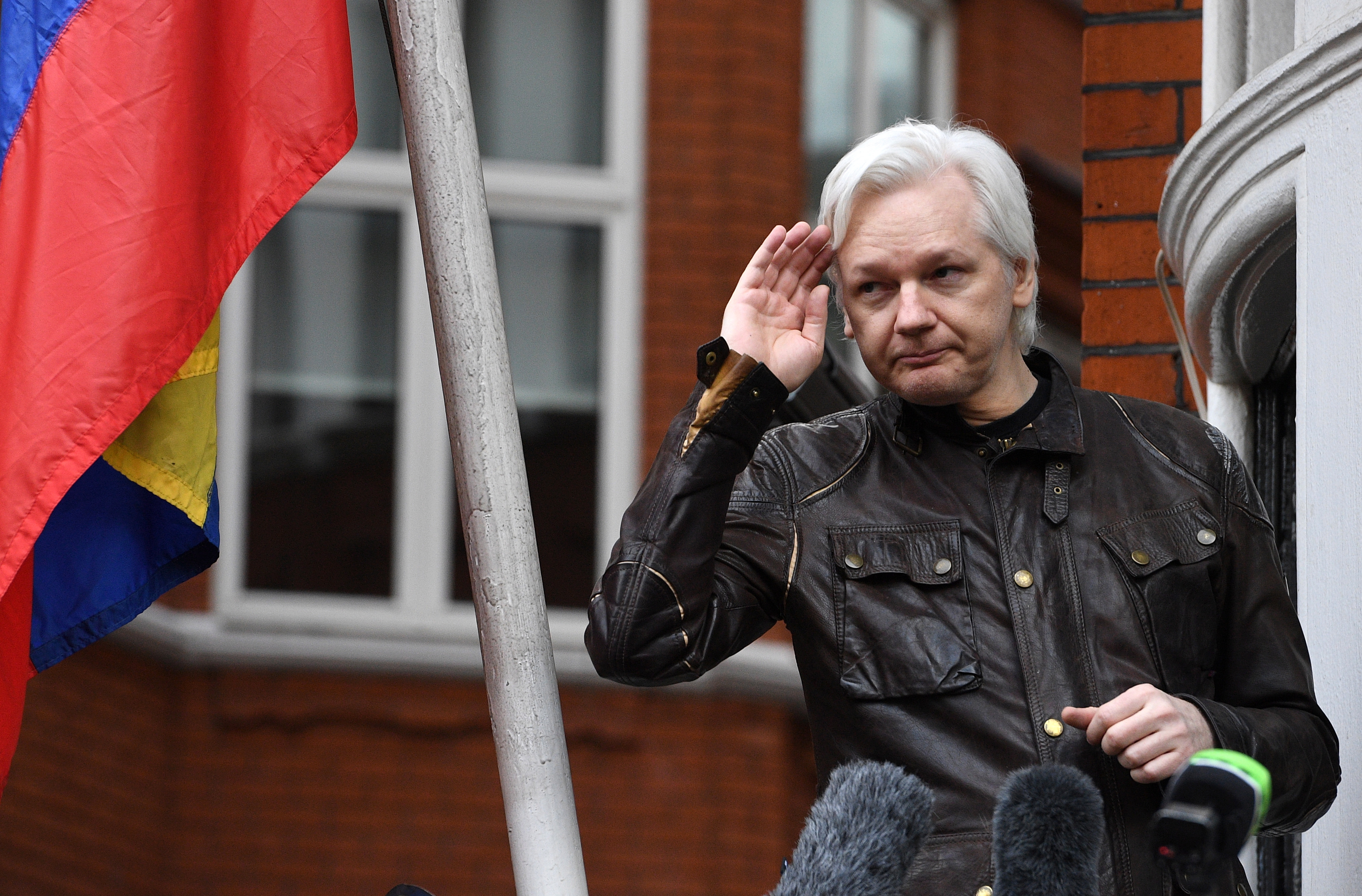 epa07104863 (FILE) - Wikileaks founder Julian Assange speaks to reporters on the balcony of the Ecuadorian Embassy in London, Britain, 19 May 2017 (reissued 18 October 2018). According to media reports on 18 October 2018, the founder of WikiLeaks, Julian Assange, is suing Ecuadors government for violating his fundamental rights and freedoms. Assange has been living in the Ecuadorian embassy in London since 2012.  EPA/FACUNDO ARRIZABALAGA