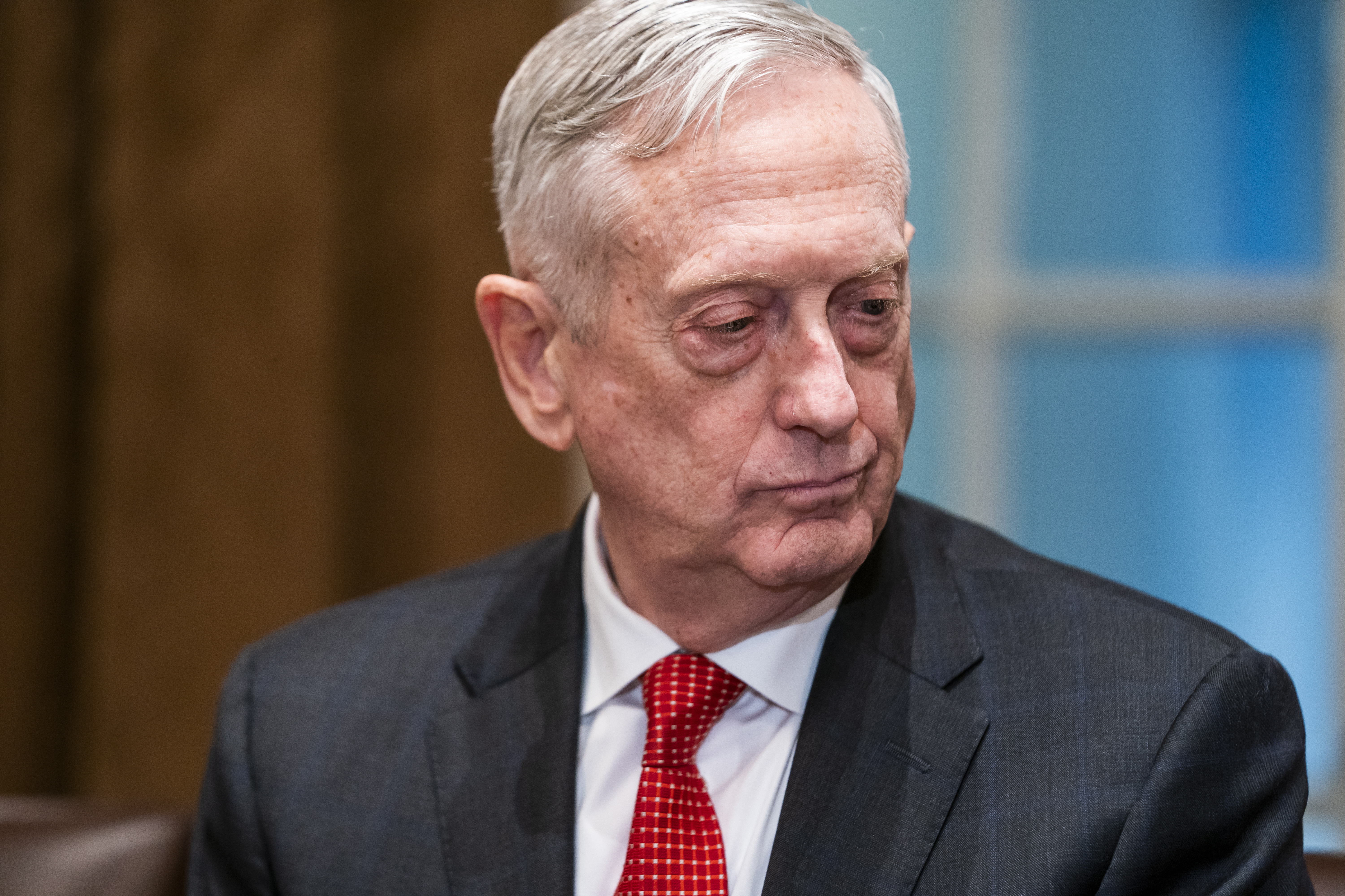 epa07114957 US Defense Secretary James Mattis listens to President Donald J. Trump (not pictured) speak to the media before meeting with senior military advisors in the Cabinet Room of the White House in Washington, DC, USA, 23 October 2018. Trump used the opportunity to speak on the Saudi cover up of the murder of Jamal Khashoggi, as well as the migrant caravan heading to the US.  EPA/JIM LO SCALZO
