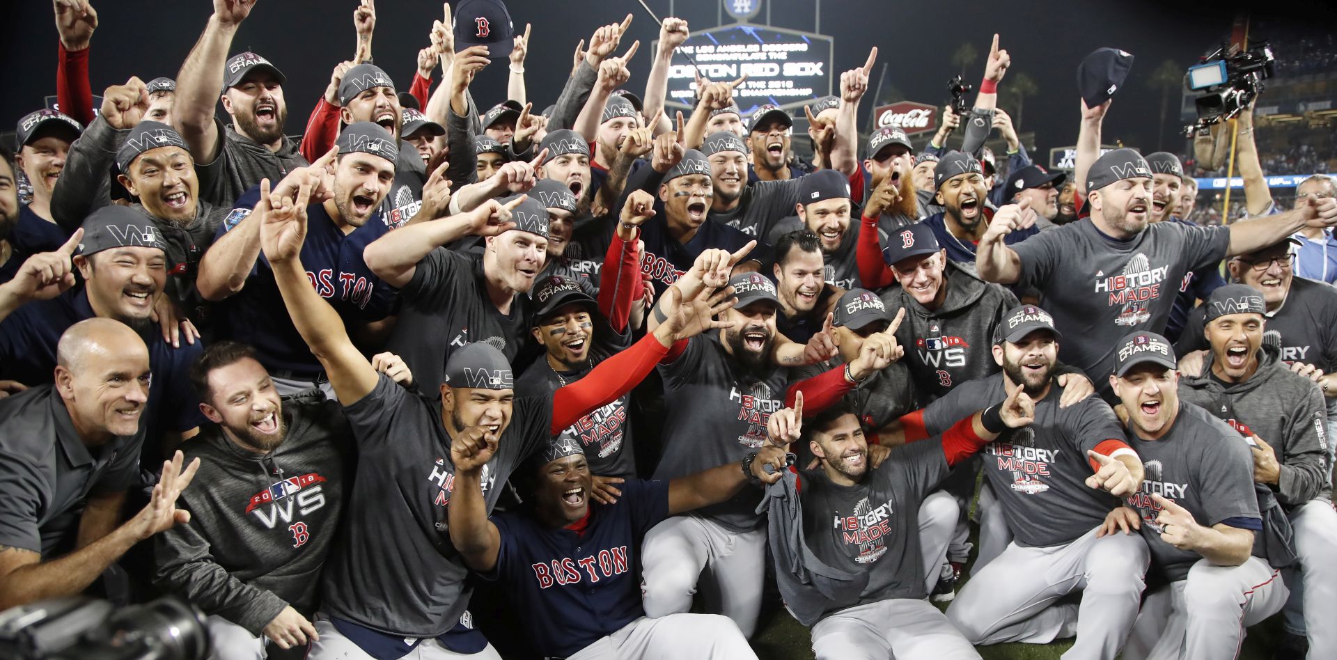 epa07128457 Boston Red Sox players celebrate after defeating the Los Angeles Dodgers in game five of the World Series at Dodger Stadium in Los Angeles, California, USA, 28 October 2018. The Red Sox win the series 4-1 to become the World Champions of Major League Baseball.  EPA/MIKE NELSON