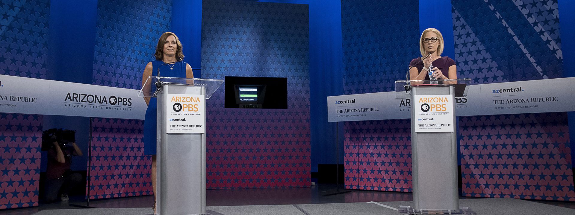 epa07096159 Republican Senate candidate Martha McSally (L) and Democatic Sentate candidate Kyrsten Sinema (R) prepare to debate at the studios of the KAET publiuc television station in Phoenix, Arizona, 15 October 2018. The two are competing for Republican Senator Jeff Flake's senate after he ststed that he will not seek re-election.  EPA/RICK D'ELIA