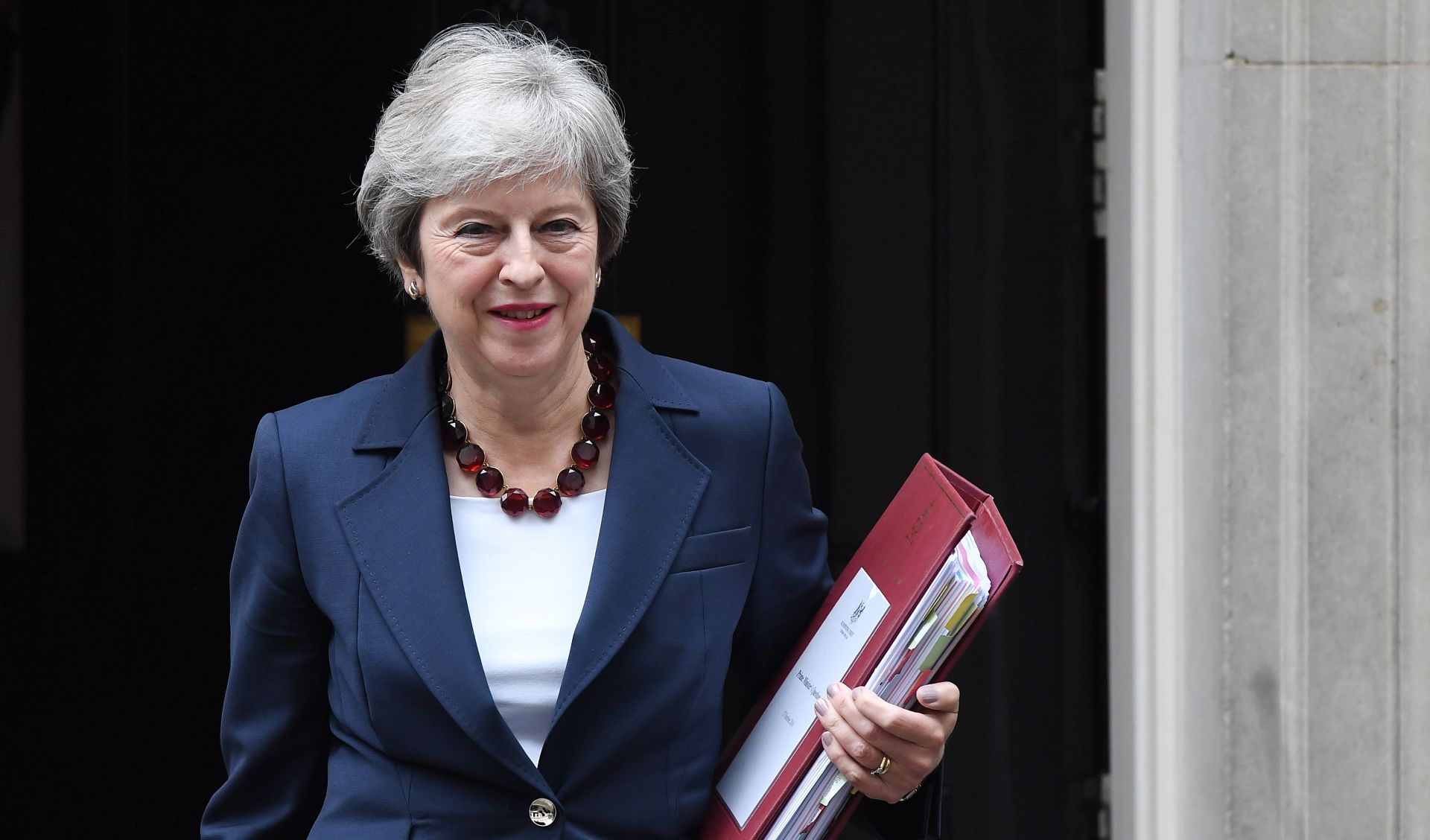 epa07099494 British Prime Minister Theresa May departs Downing Street for Prime Minister questions at parliament in London, Britain, 17 October  2018. May is set to meet EU leaders later today in Brussels.  EPA/ANDY RAIN