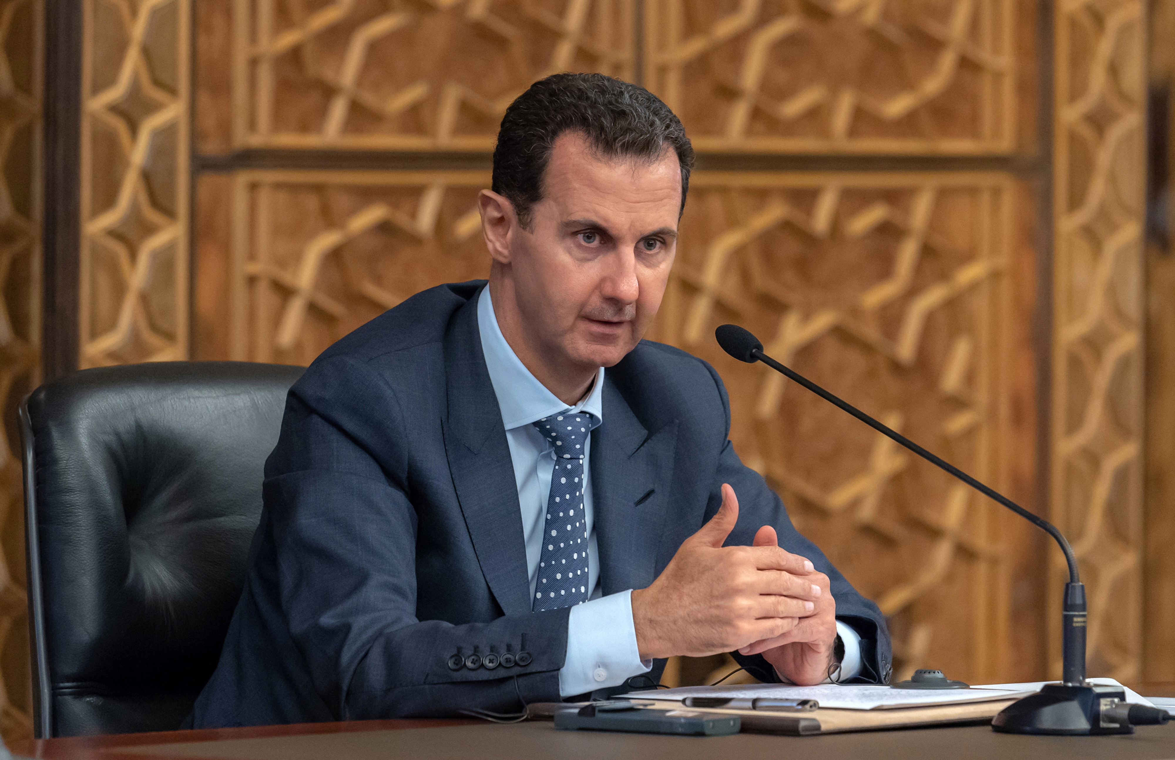 epa07134053 A handout photo made available by Syria's Arab News Agency (SANA) shows Syrian President Bashar al-Assad speaking during a meeting with delegations of the Executive Committee of the World Peace Council and the International Young Democrat Union (IYDU) in Damascus, Syria, 31 October 2018. According to SANA, Assad said that his country has paid a 'dear price' to preserve its independence. He also said that some western countries have 'narrow interests' adding that those countries do not feel hesitant to ignite wars to achieve their interests by using extremist thoughts which were promoted by the US administration in the 1980s.  EPA/SANA HANDOUT  HANDOUT EDITORIAL USE ONLY/NO SALES