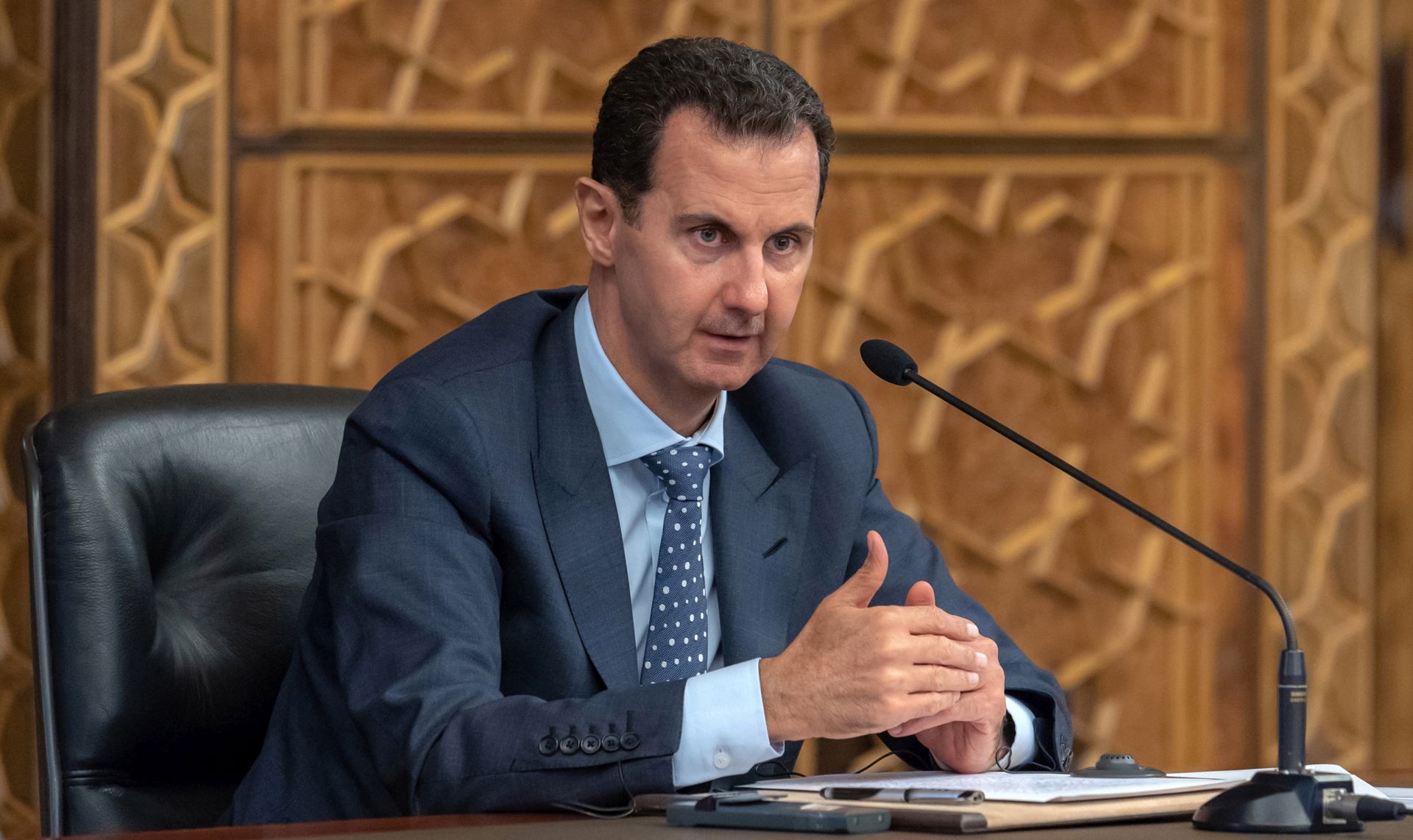 epa07134053 A handout photo made available by Syria's Arab News Agency (SANA) shows Syrian President Bashar al-Assad speaking during a meeting with delegations of the Executive Committee of the World Peace Council and the International Young Democrat Union (IYDU) in Damascus, Syria, 31 October 2018. According to SANA, Assad said that his country has paid a 'dear price' to preserve its independence. He also said that some western countries have 'narrow interests' adding that those countries do not feel hesitant to ignite wars to achieve their interests by using extremist thoughts which were promoted by the US administration in the 1980s.  EPA/SANA HANDOUT  HANDOUT EDITORIAL USE ONLY/NO SALES