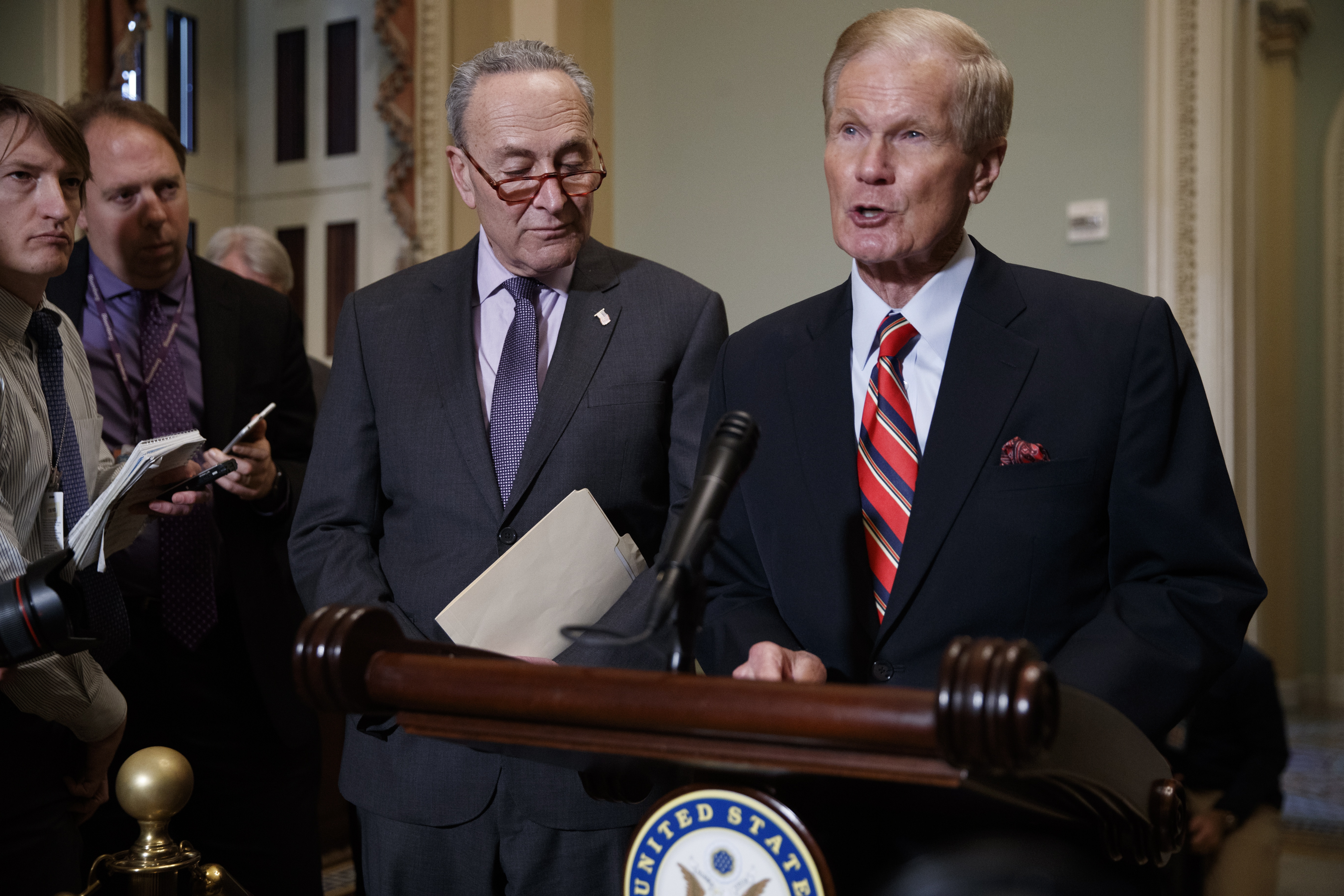 epa07163535 Democratic Senator from Florida Bill Nelson (R), with Senate Minority Leader Chuck Schumer (L), delivers a statement to the news media in the US Capitol in Washington, DC, USA, 13 November 2018. Senator Nelson and Leader Schumer are calling for every vote in the Florida Senate race to be counted and for Florida Governor Rick Scott, Senator Nelson's opponent, to recuse himself from the vote count.  EPA/SHAWN THEW