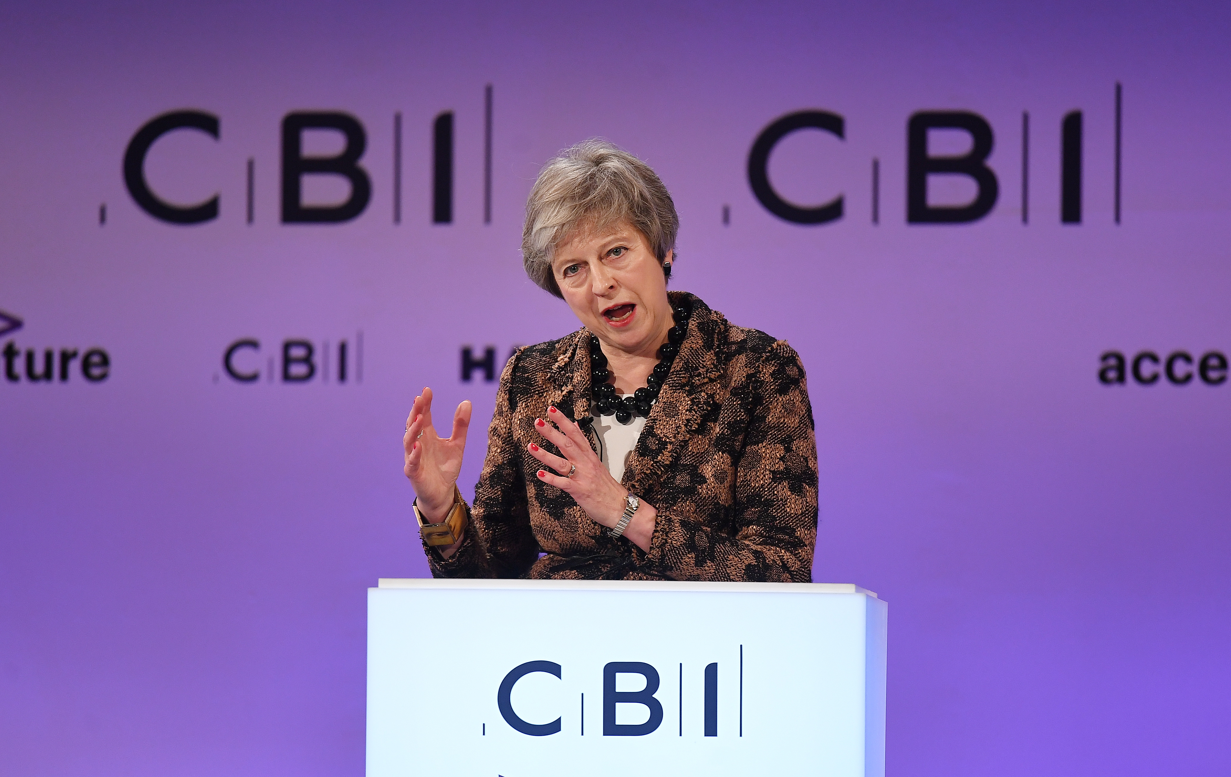 epa07176940 British Prime Minister Theresa May speaks at the annual Confederation of British Industry (CBI) conference in London, Britain, 19 November 2018. Reports state that guest speaker Theresa May is to tell business leaders in her speech that her Brexit deal with the EU will allow Britain to take back control of its borders.  EPA/ANDY RAIN
