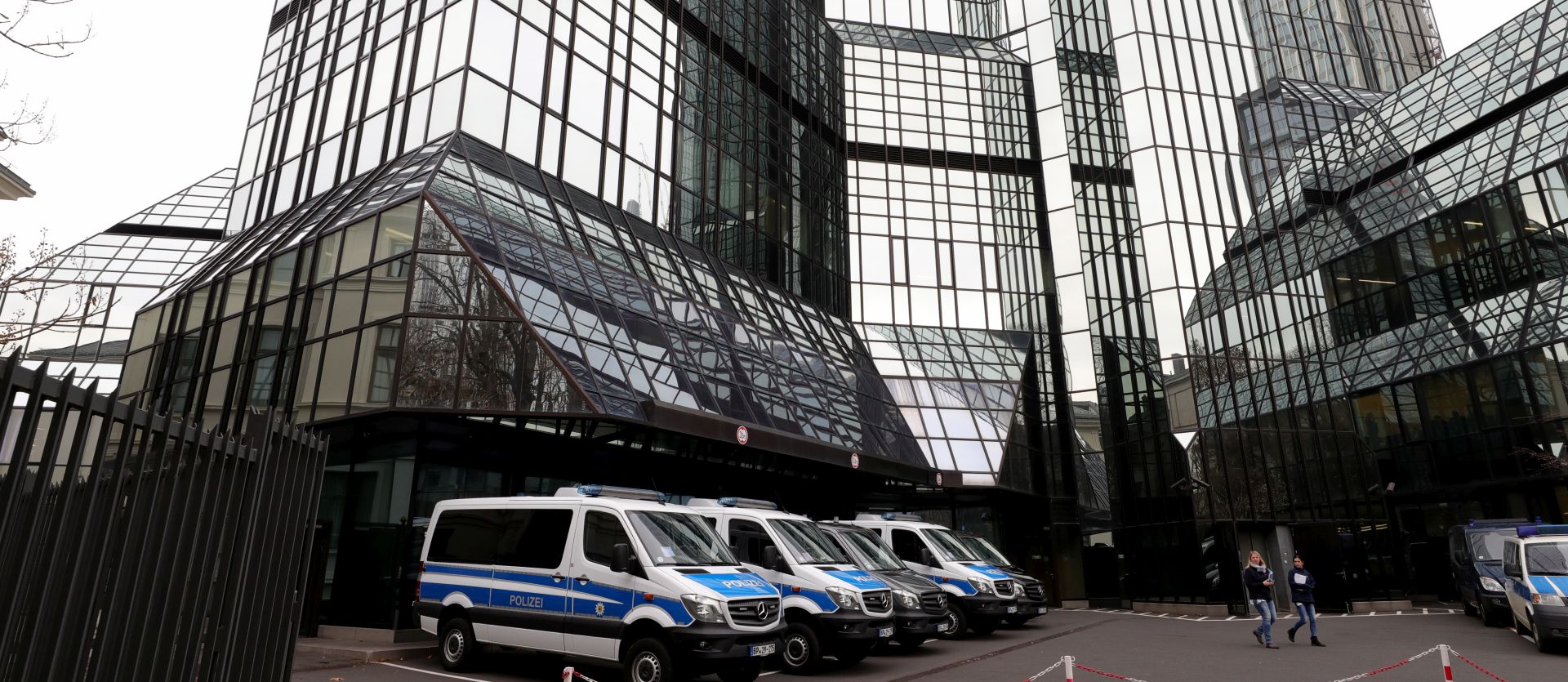 epa07196957 Police cars stand in front of Deutsche Bank headquarters in Frankfurt, Germany, 29 November 2018. Frankfurt prosecutors office confirmed to epa searches on suspicion of money laundering at Deutsche Bank facilities in the Frankfurt area.  EPA/ARMANDO BABANI
